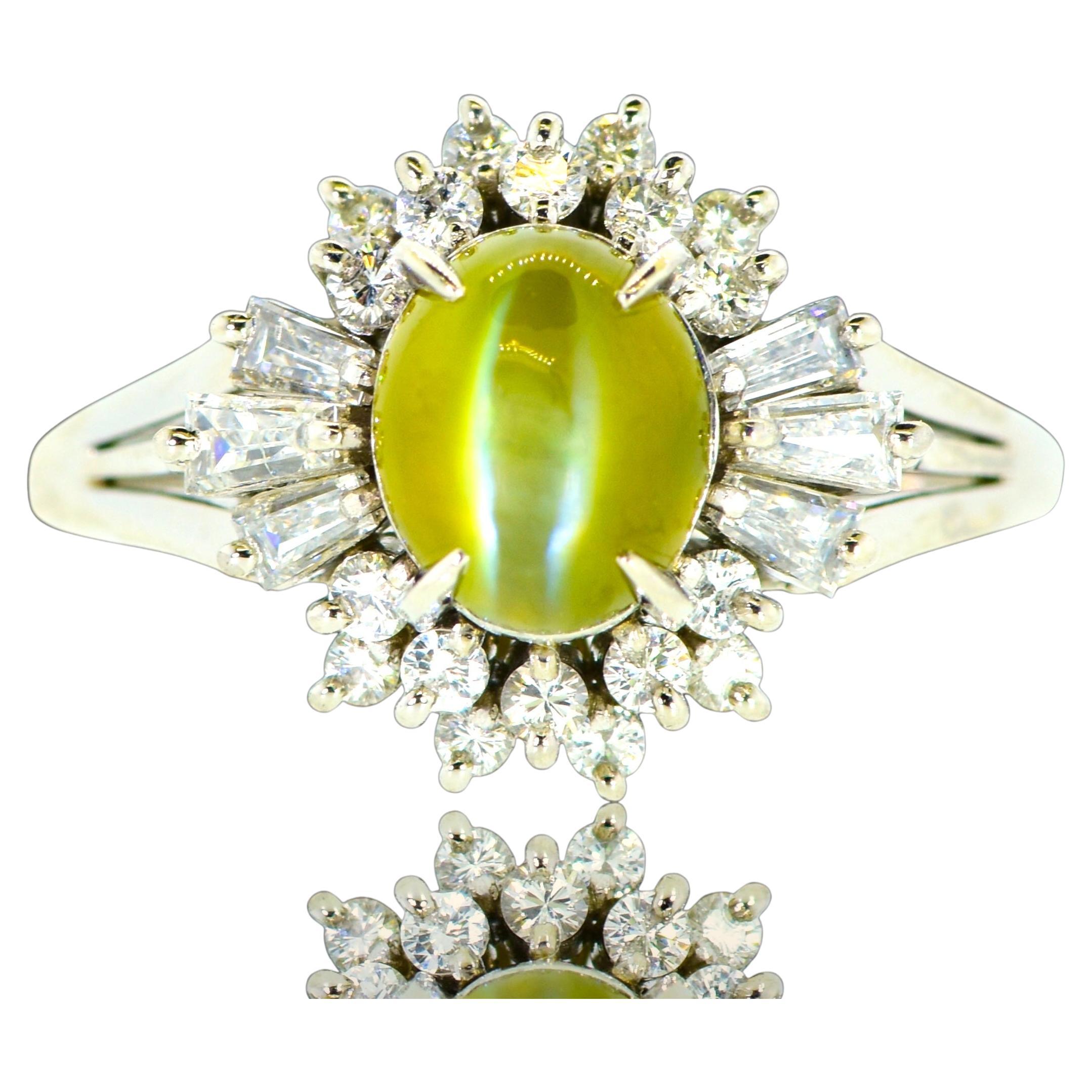 Very Fine Intense color Cat's Eye Chrysoberyl & White Diamond Platinum Ring. For Sale