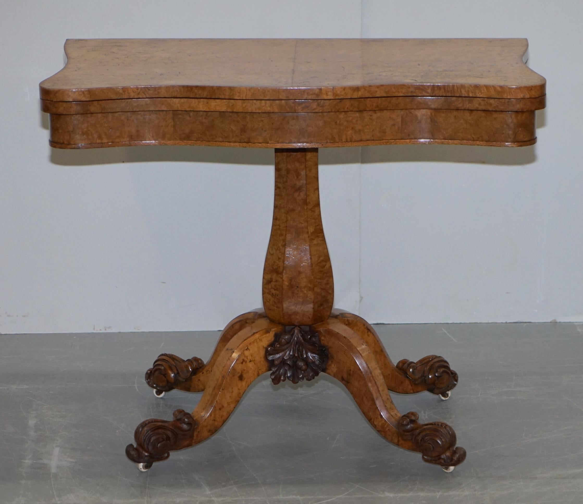 We are delighted to offer for sale this very fine original circa 1835 William IV Pollard oak carved fold over card table with JC Patent stamped porcelain castors

A William IV pollard oak and carved oak folding tea table, circa 1835, the