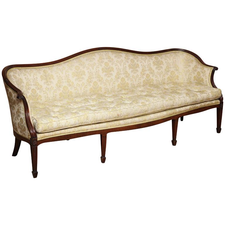 A Wood & Hogan sofa with a disciplined elegance for the special home. From a branch of the family of the Queen Mother of England came the original of this magnificent Hepplewhite sofa which stood in the ancestral home of the Bowes-Daley family in