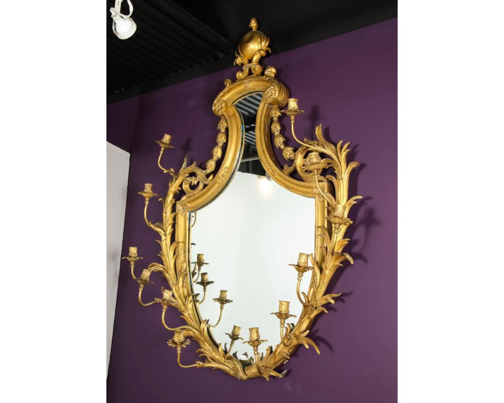 Very Fine Gilt-Bronze Ormolu Girandole Mirror by Edward F. Caldwell & Co.  

Very good quality. Solid bronze, with beveled mirror and candleholders  

Measure: 56