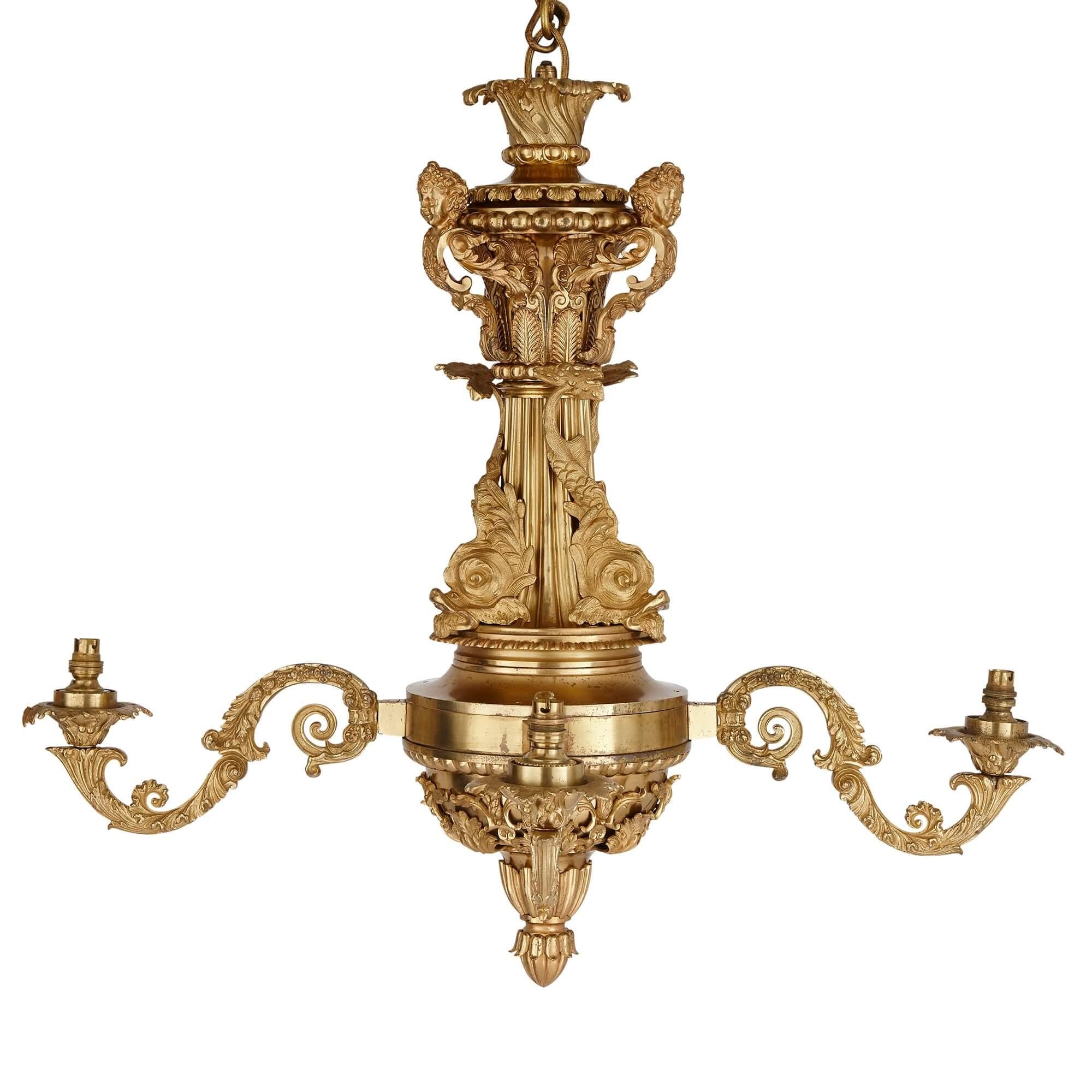 Gilt bronze Régence style antique chandelier.
French, 19th century
Measures: height 85cm, diameter 96cm

This beautiful chandelier has been cast in gilt bronze, designed to reflect the light to maximum effect. It has four lights, which have