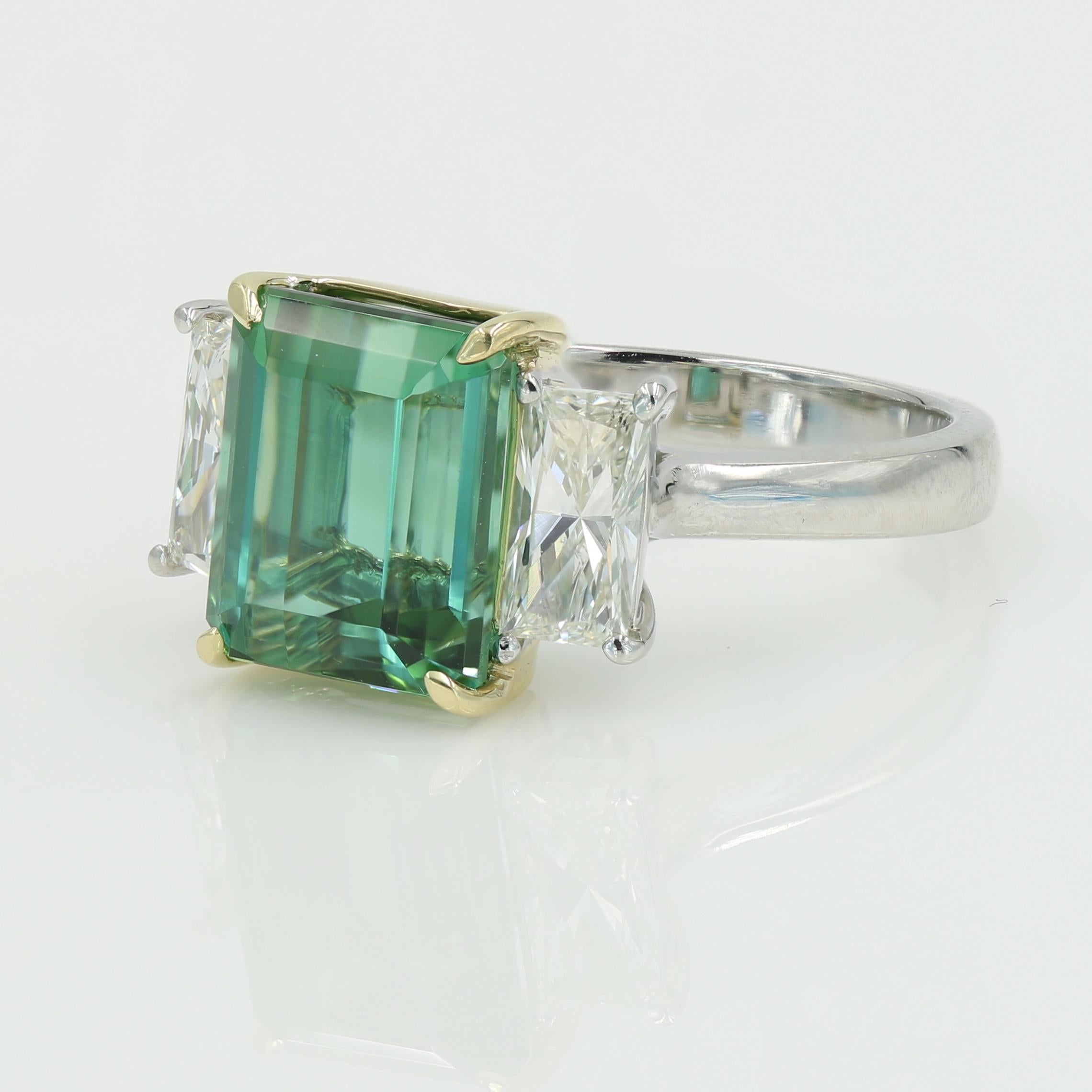 Contemporary Very fine green Tourmaline in a Platinum & 18kt YG mounting w 2 side diamonds