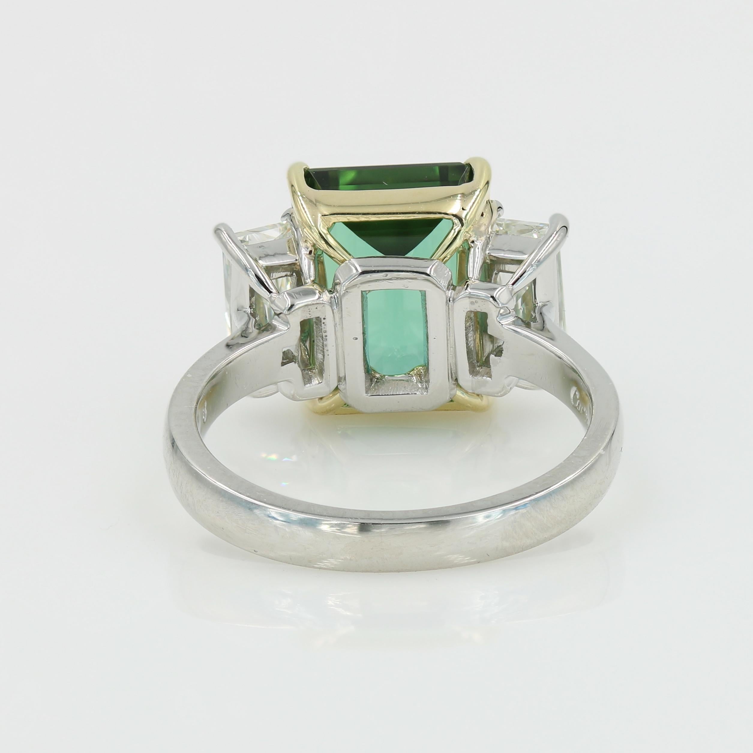 Emerald Cut Very fine green Tourmaline in a Platinum & 18kt YG mounting w 2 side diamonds