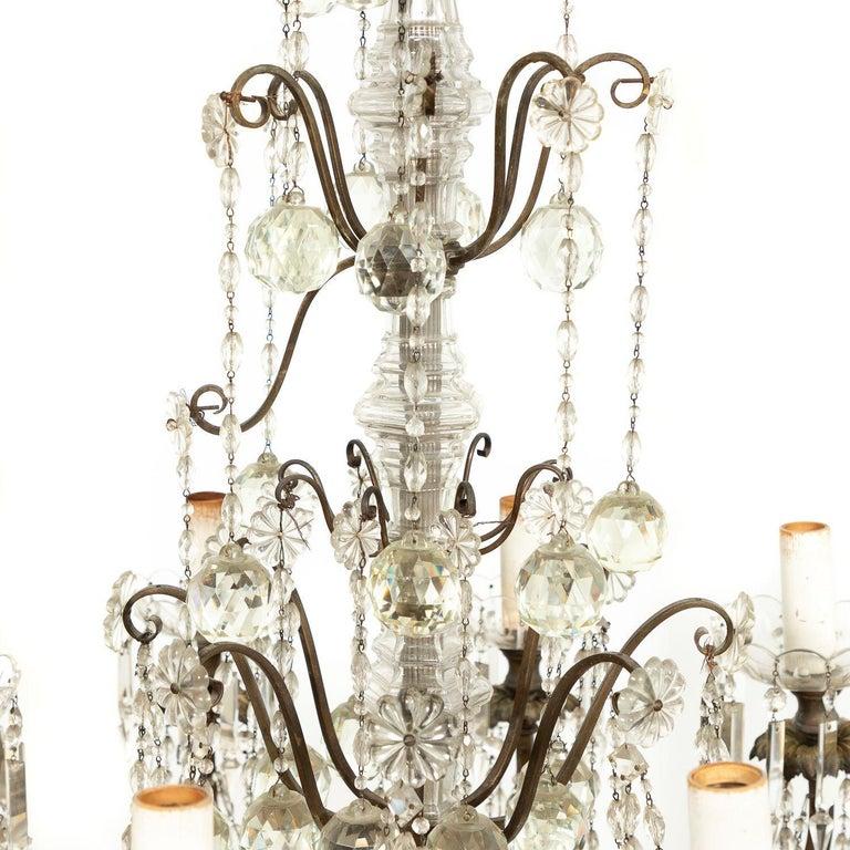 A very fine Louis Phillipe style chandelier having a bronze frame with hand cut crystal pendalogues along with chains of beads. France, circa 1900.
