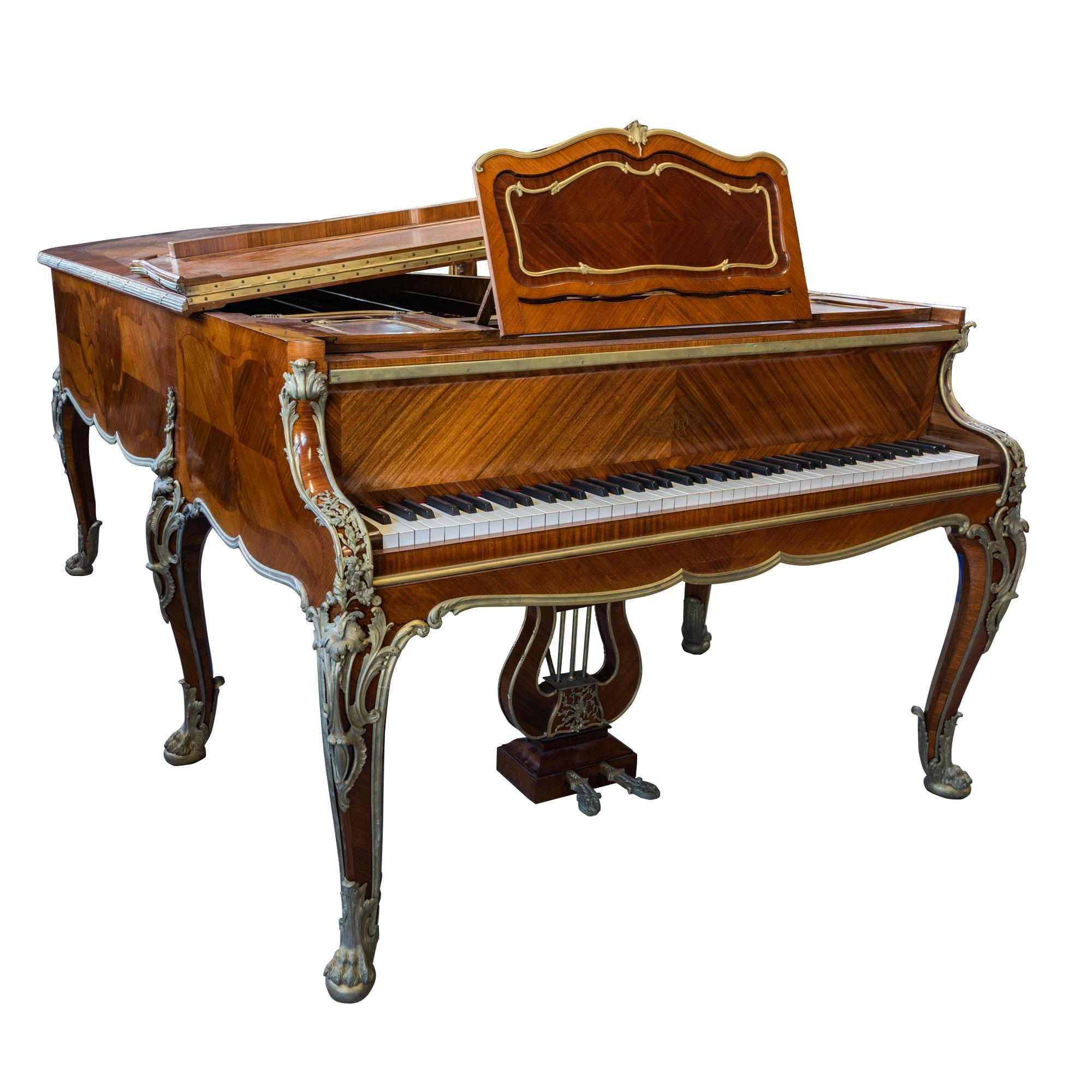 Francois Linke (1855-1946) 
A very fine Louis XV style gilt bronze mounted kingwood piano,late 19th century , signed Francois Linke, stamped Joseph-Emmanuel Zwiener, 
movement by Erard 
The quarter veneered case inlaid with cartouche panels