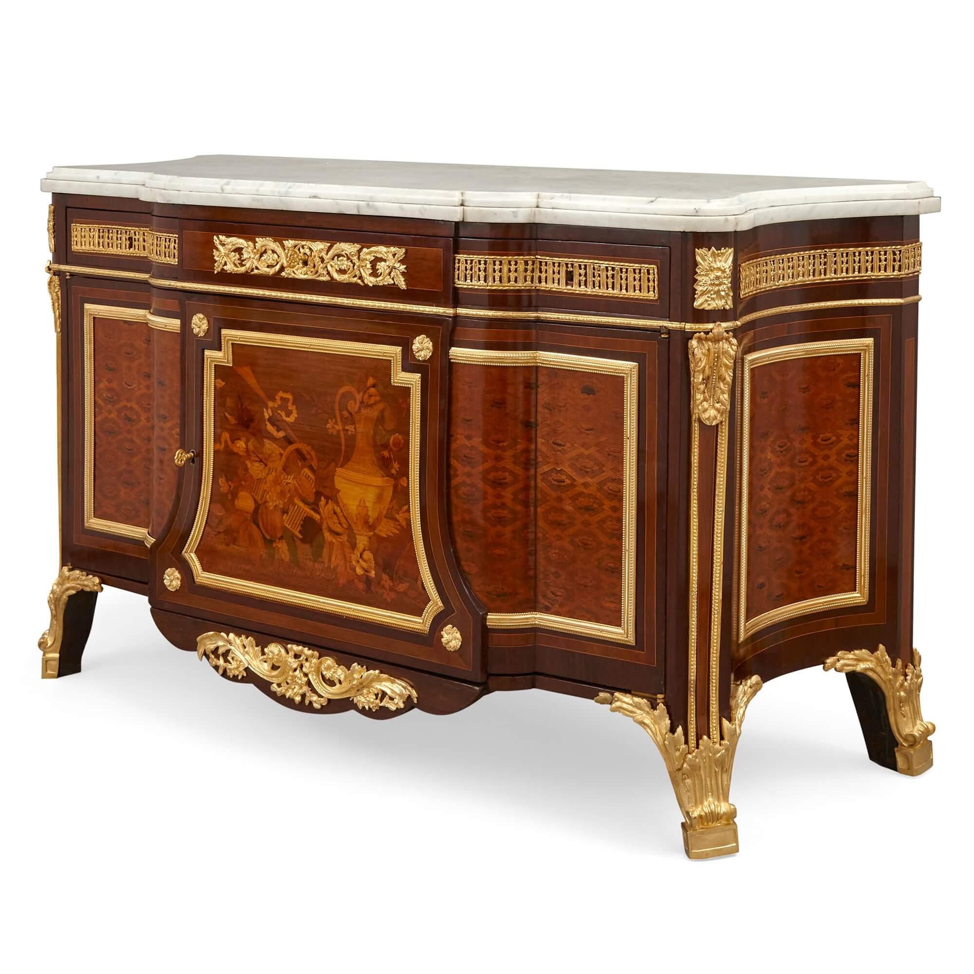 Very fine Louis XVI style ormolu-mounted marquetry commode
French, Early 20th Century
Height 95cm, width 162cm, depth 59cm

After an important model by Jean-Henri Riesener (French, 1734-1806), a highly renowned ebeniste of great standing, this
