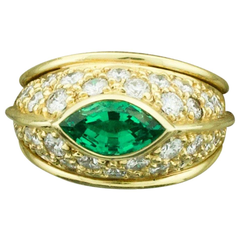 Very Fine Marquise Emerald and Diamond Ring in 18k For Sale