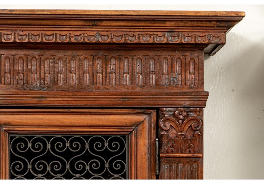 Renaissance Revival Very Fine Matched Pair of Antique Italian Carved Cabinets with Grille Work Doors
