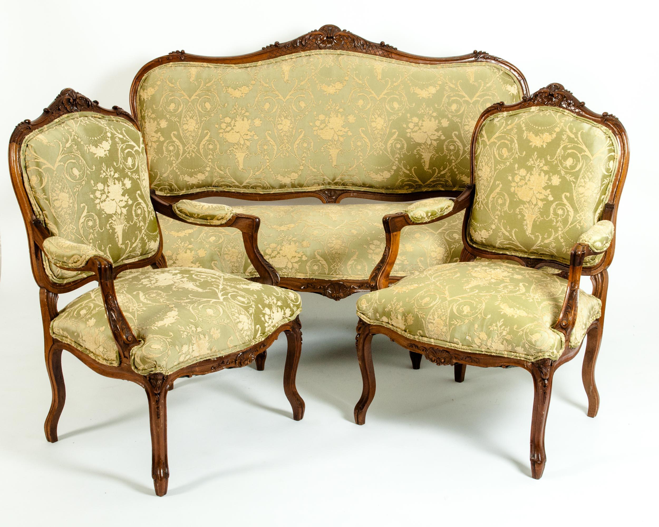 Very fine mid-19th century mahogany wood frame three-piece salon suite. The set include one settee and two armchairs. Each piece is very sturdy and in good antique condition with age / use appropriate wear. The upholstery is very immaculate. Each