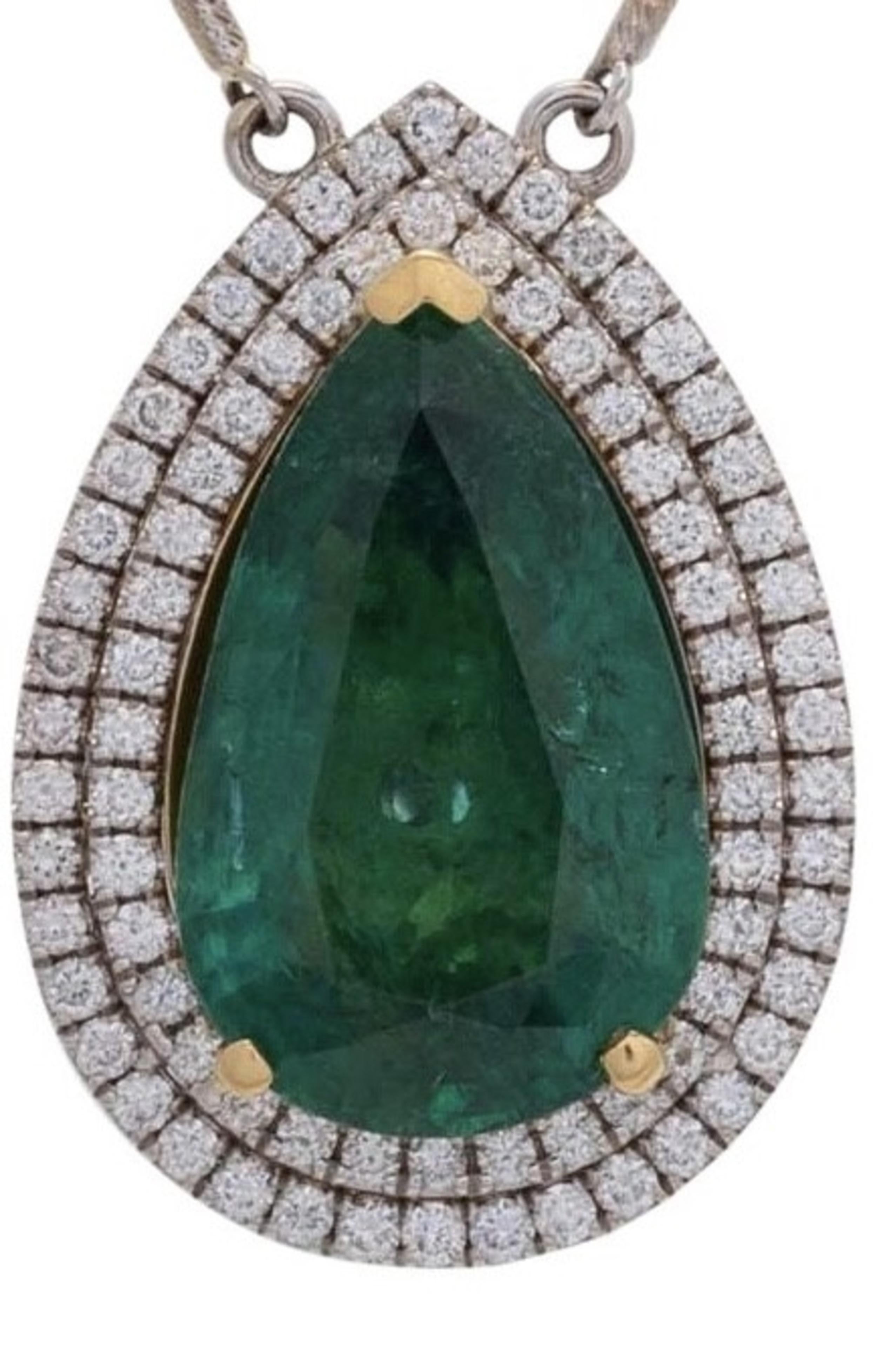 Very Fine Emerald and Diamond Pendant Necklace , 
The pendant set with a pear-shaped emerald weighing 9.20 carats, the double surround gallery set with brilliant-cut diamonds
weighing approximately 1.05 carats, 
to a necklace of belcher chain