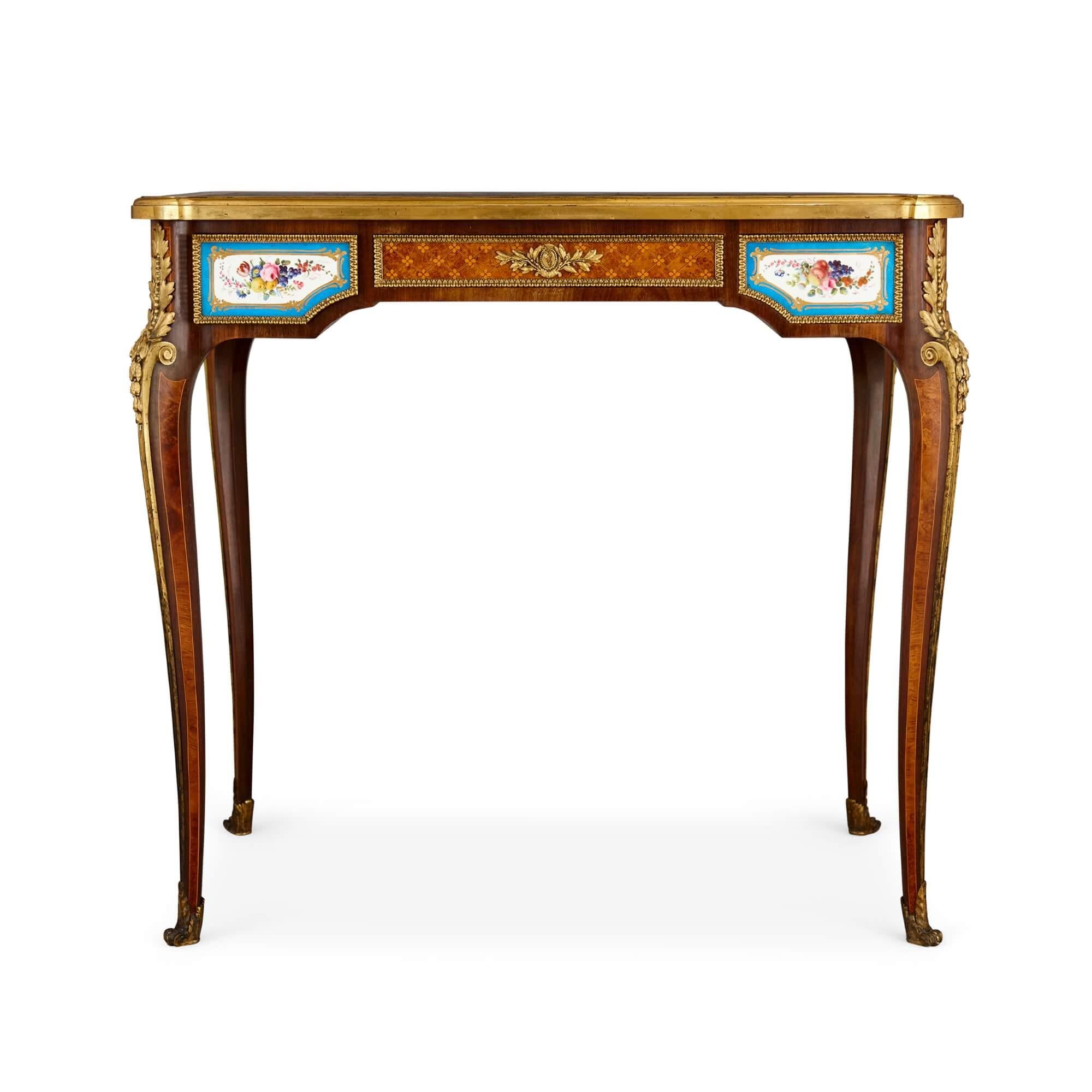 Very fine ormolu, porcelain and marquetry writing desk by Henry Dasson
French, 1890
Height 74cm, depth 80cm, depth 50cm

By Dasson, Henry (French, 1825-1896), a leading ébéniste of the French Belle Époque, this beautiful, delicate, and