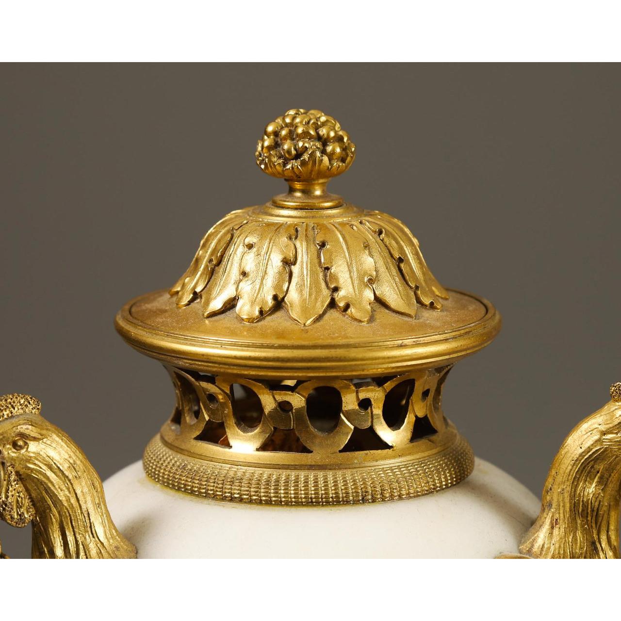 French Very Fine Pair of Gilded Bronze and White Marble Covered Urns For Sale
