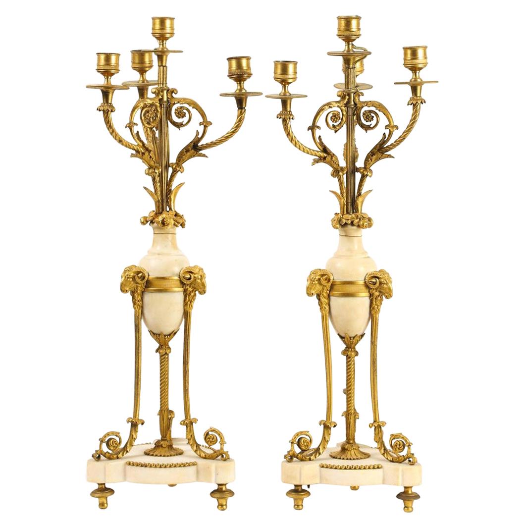 Très belle paire de candélabres Louis XVI à quatre lumières en bronze doré et marbre