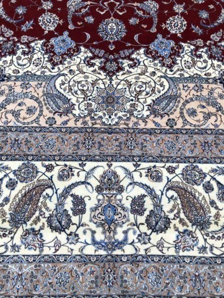 Very fine Persian Rug Nain 1000 Knots per inch, Size 16.7 x 26.5 Iran Nain  Wool and Silk with Silk Foundation. Around 60,000,000 knots tied by hand one by one. This is 45 years of artistic labor. 6 weavers would finish this in 7.5 years. This rug