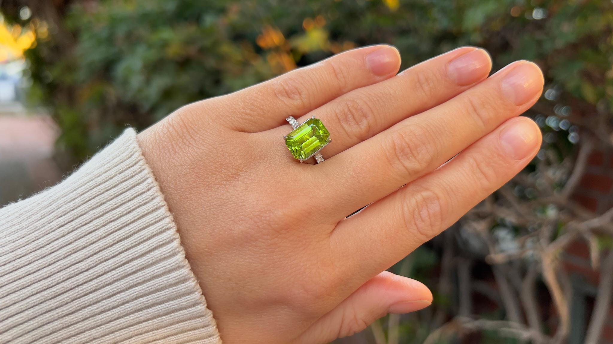 Emerald Cut Very Fine Peridot Ring With Diamonds 6.40 Carats 18K White Gold For Sale