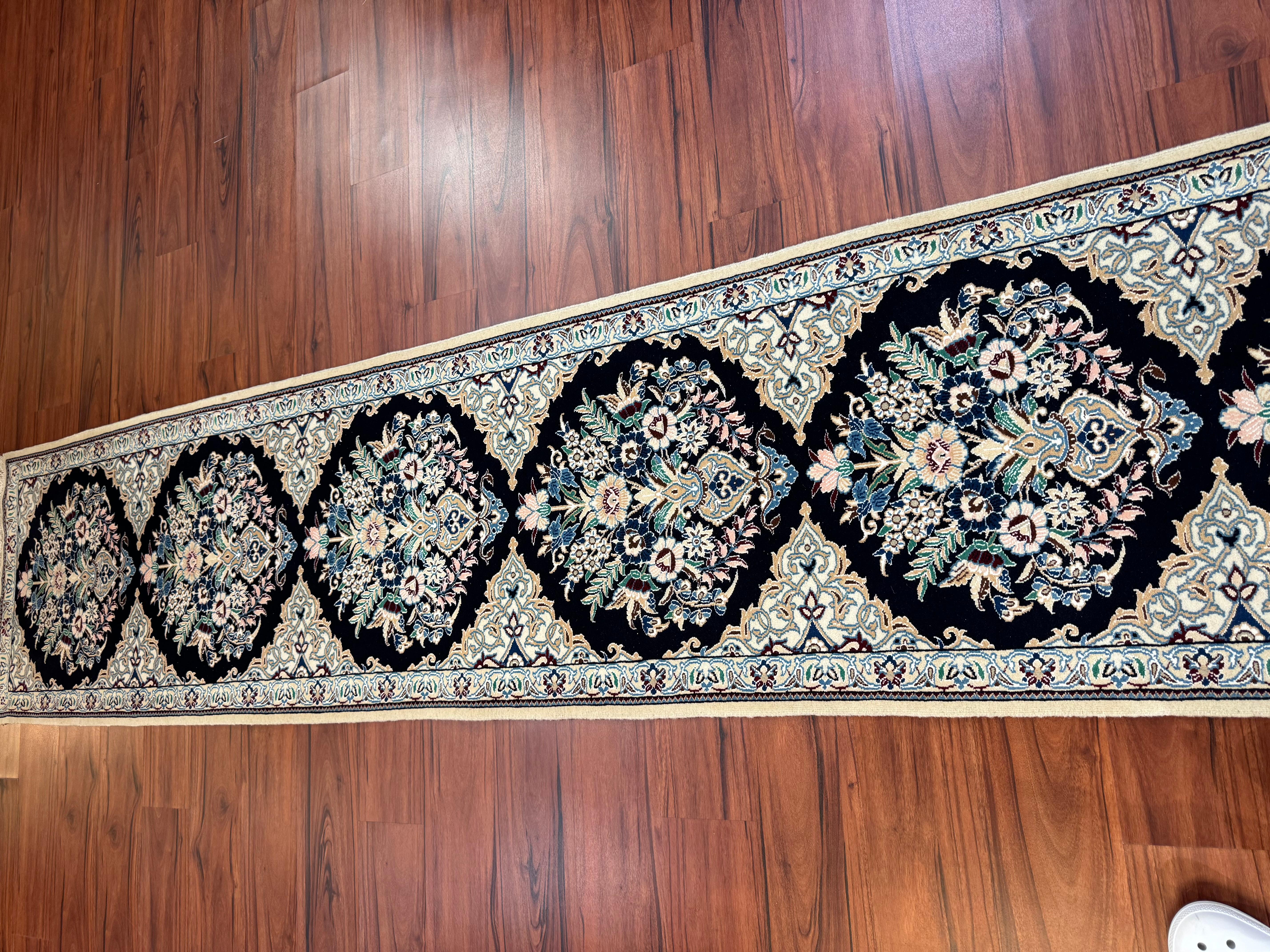 A stunning Persian Nain Runner Rug made from silk and wool. This rug originates from iran in the late 20th century and is in excellent condition. Feel free to message me regarding this item or any other posted on my page! 
