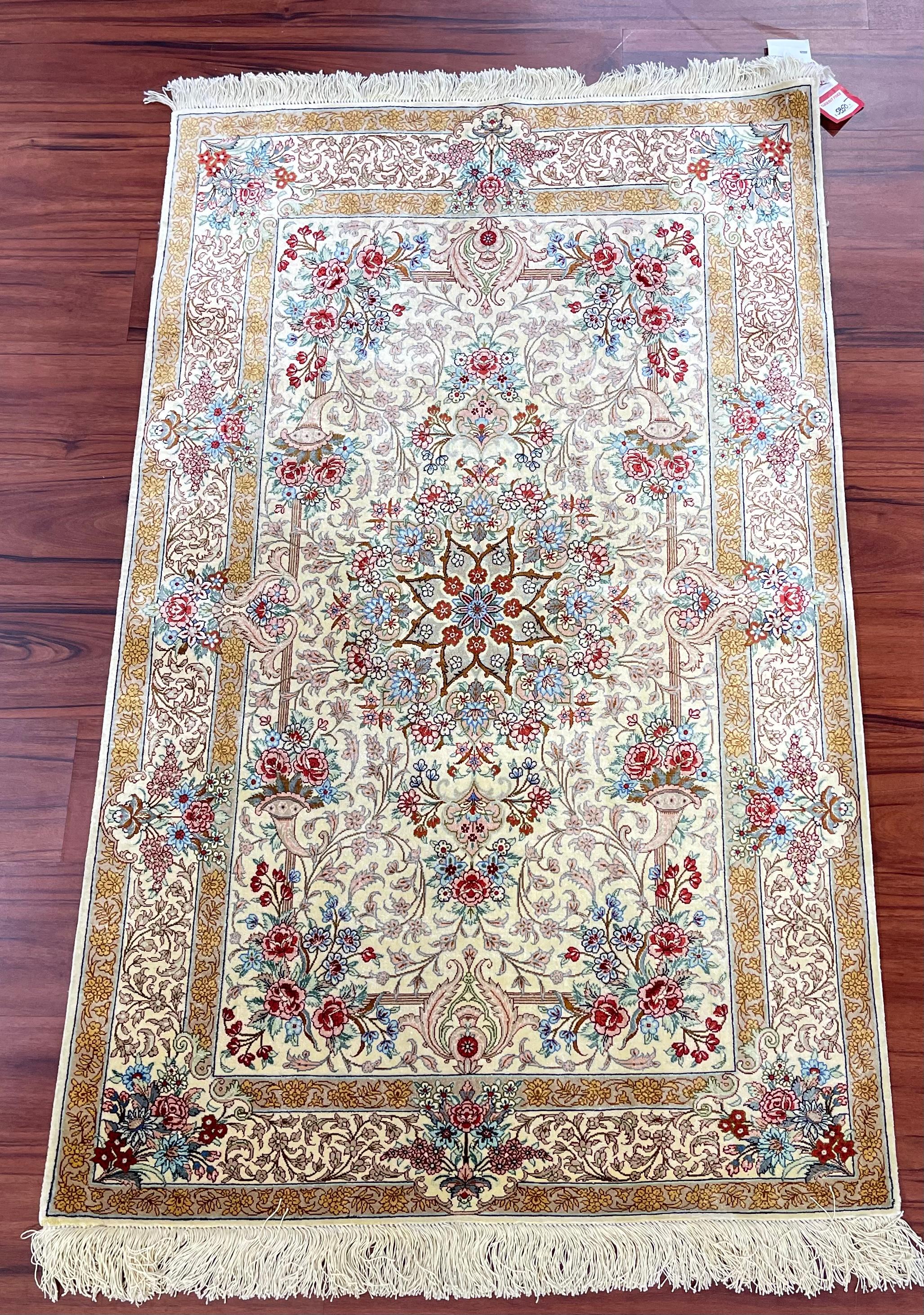 A stunning 100% Silk Persian Qum Rug that originates from Iran in the late 20th century. This piece is fully hand-knotted and is in excellent condition. Feel free to message me any questions regarding this rug or any other listed on my page!