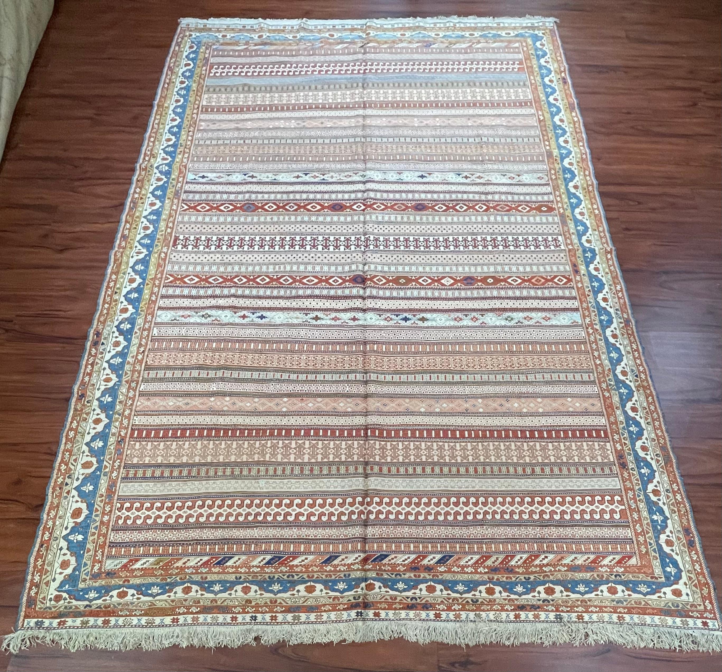 A stunning 100% Persian Silk Soumak Rug that originates from Iran in the late 20th Century. This piece is hand-knotted and in excellent condition. Feel free to message me regarding this item or any other that is listed on my page!