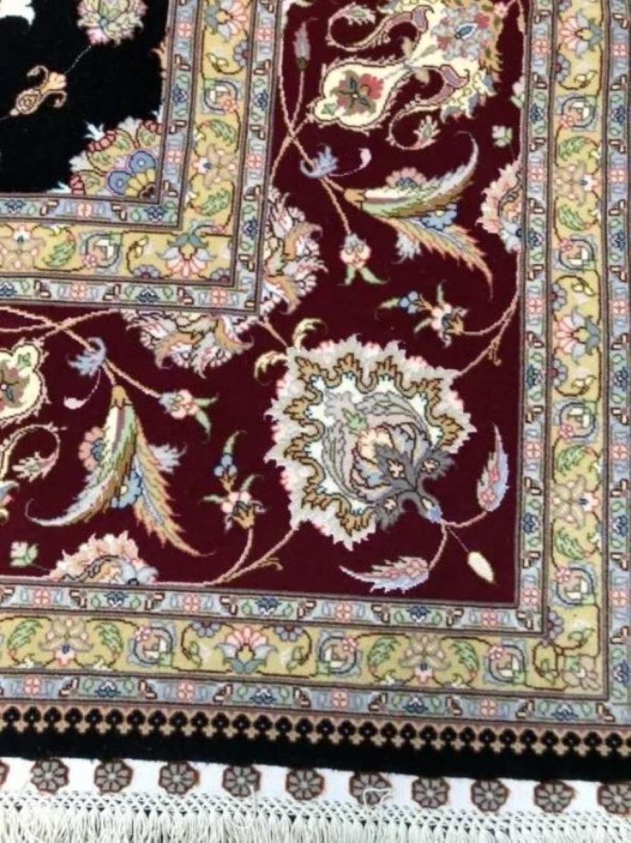 Very fine Persian Tabriz rug with wool and silk pile with silk foundation. This rug has approximately 340 knots per sq inch with a total of 4,500,000 knots tied by hand one by one. It took 2.5 years to complete this beautiful piece of art.
