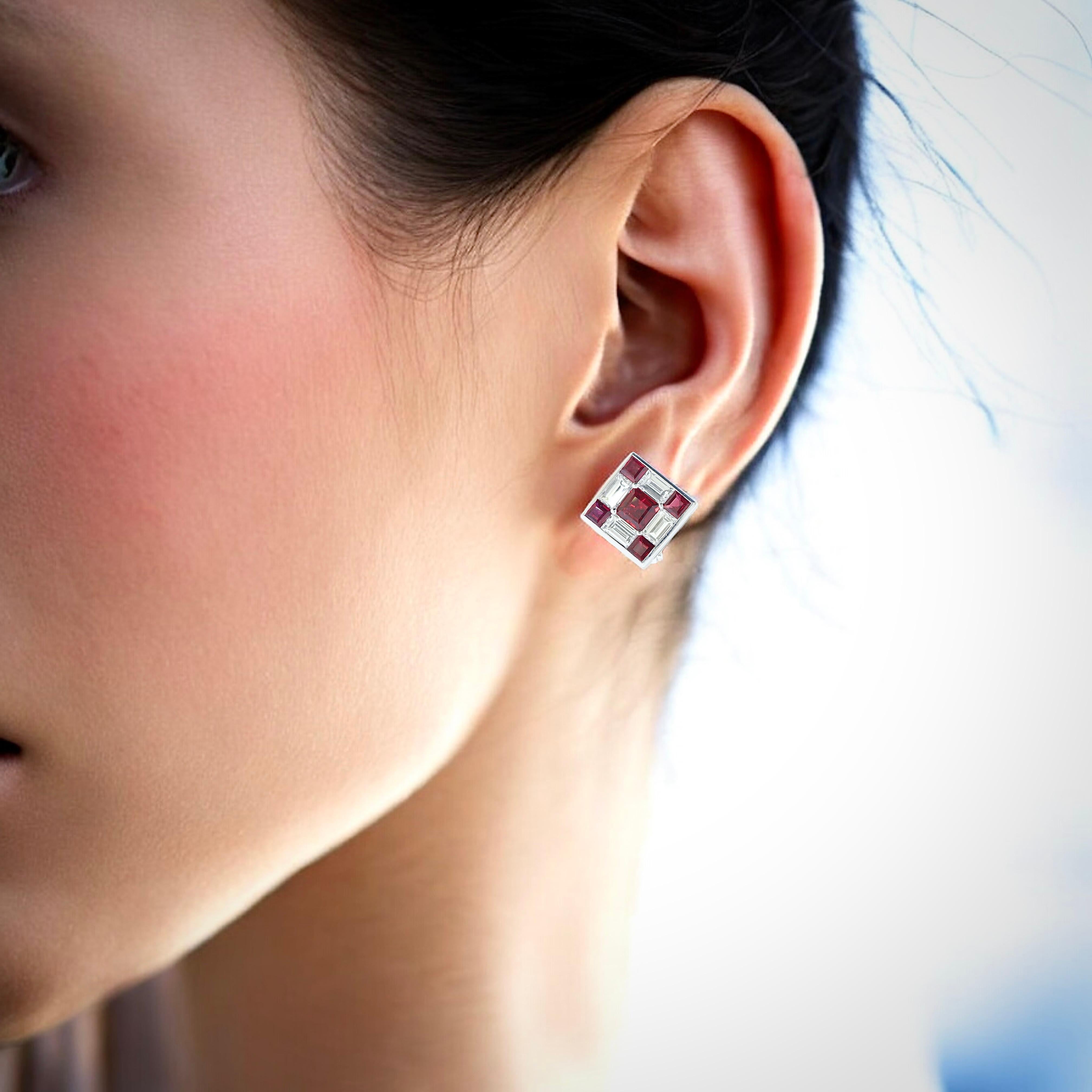 These earrings are well made with very fine diamonds and Burma rubies. The 10 well matched natural emerald cut Burma rubies display the classic 