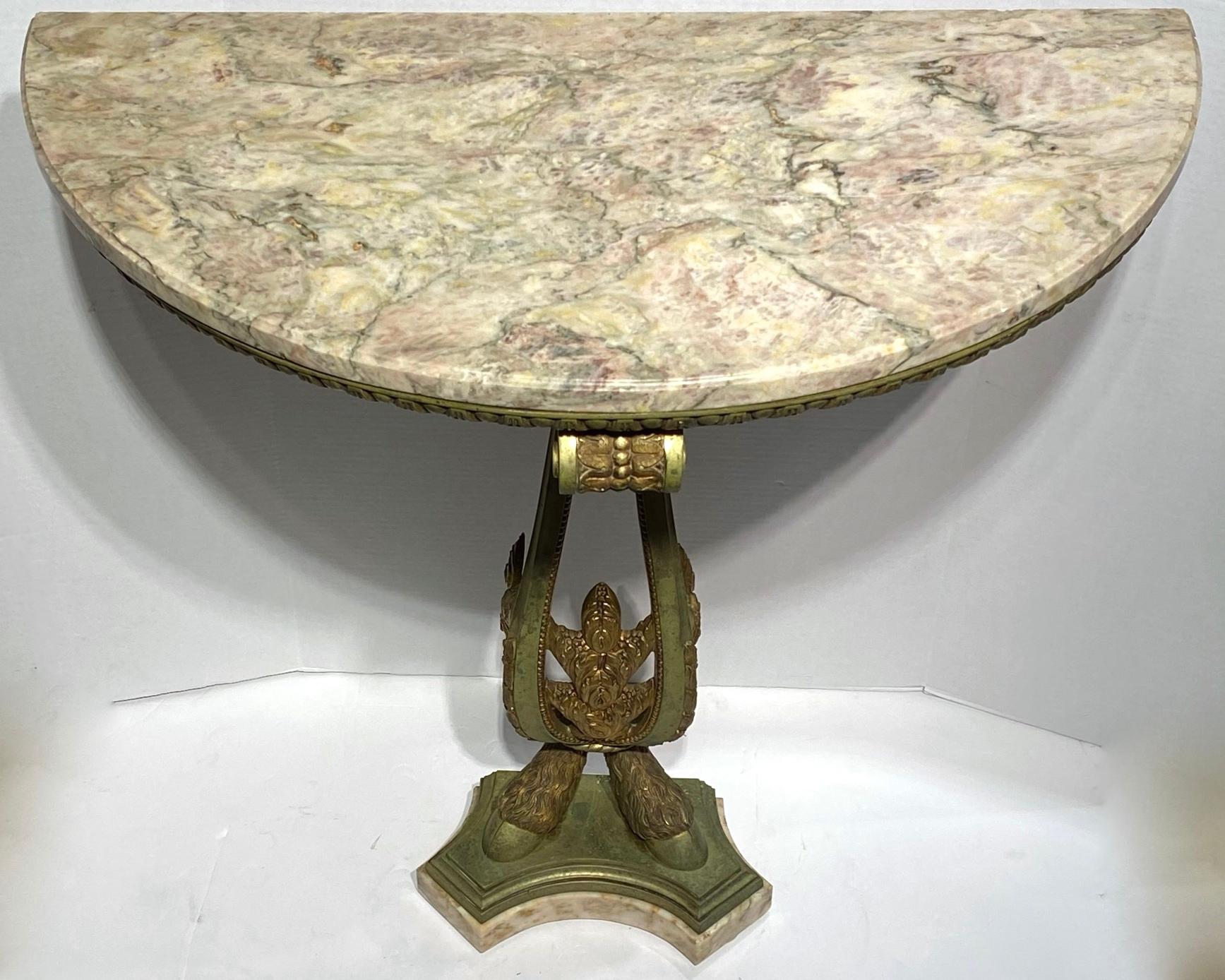 Very fine quality French late 19th-early 20th century bronze marble-top demilune console table.

  