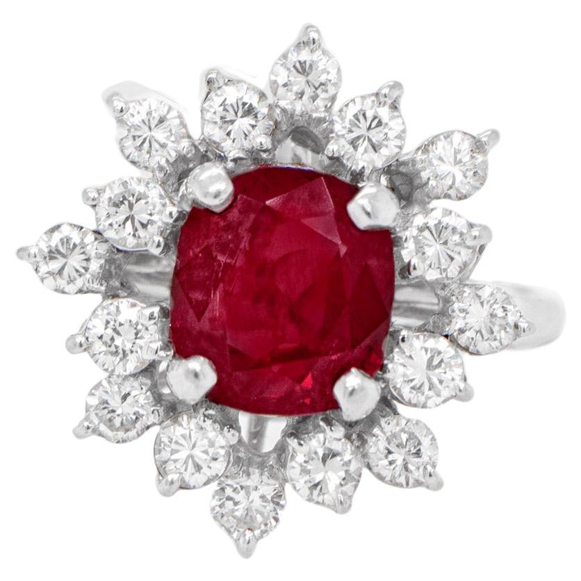 Très belle bague en or 14 carats avec rubis de 2,50 carats et halo de diamants