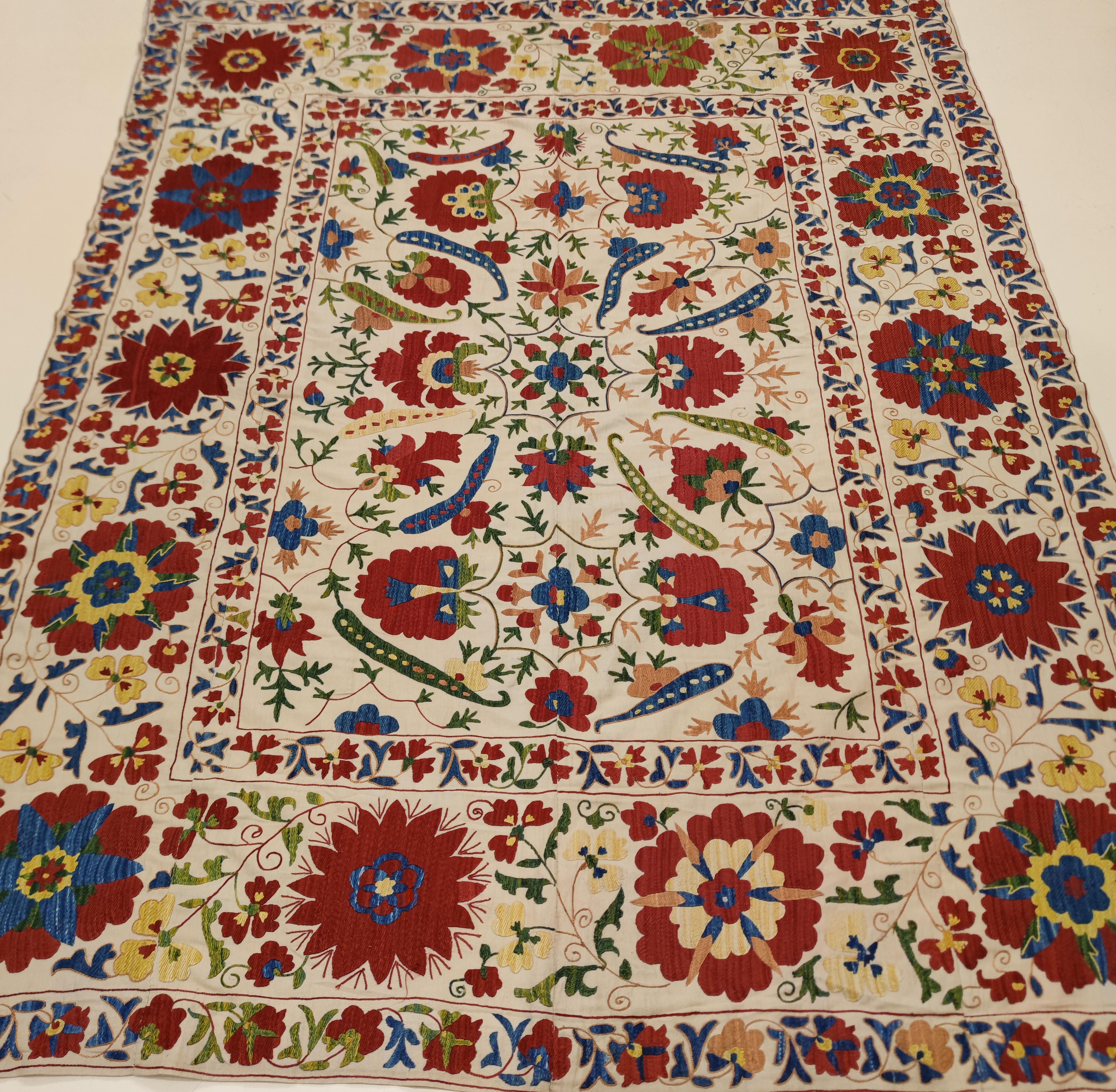 The Suzani textiles from Uzbekistan represent the most refined and elegant manifestation of Central Asian textile art tradition. Silk on cotton embroideries such as this one were woven by young women in order to enrich their dowry, which is why they