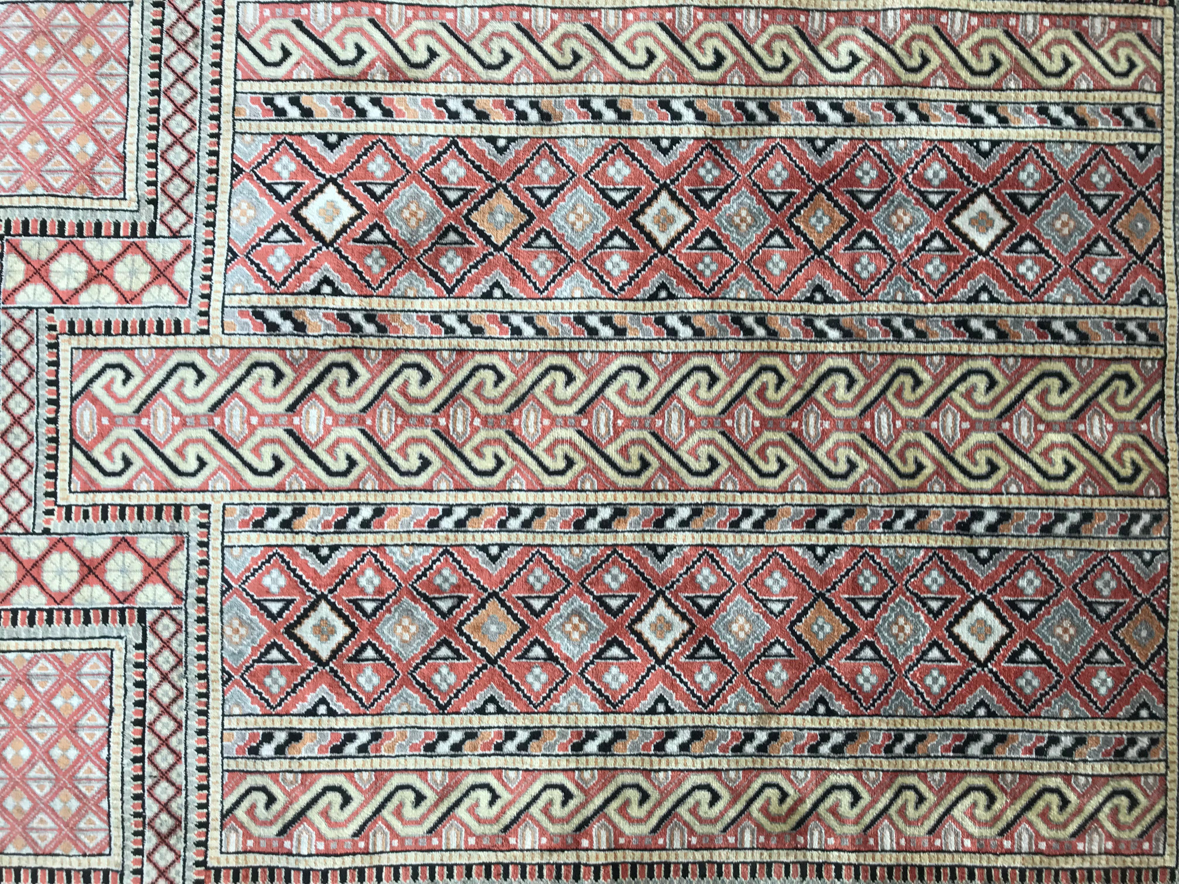Nice little silk Turkish rug, with beautiful geometrical design with mihrab and nice colors with beige, pink, yellow and black, finely hand knotted with silk velvet on silk foundation. Size: 2ft 0.02inch x 2ft 11.44inch.
