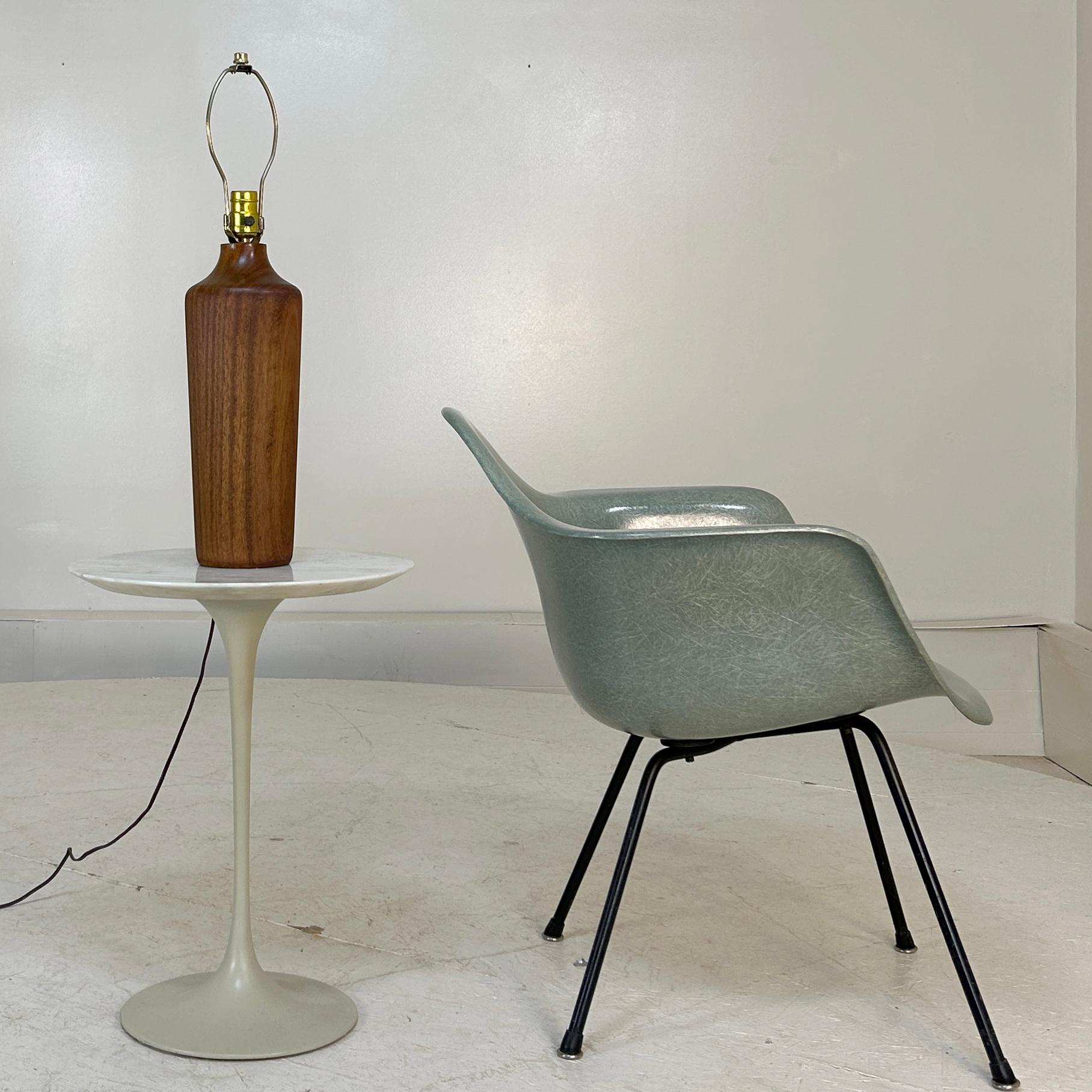 Table lamp,teak, circa 1965 Turned on a lathe, produced in Denmark almost certainly by ESA but unmarked.  Measures: 5.5 wide x 23.5 inches to finial. Body is 15 inches tall. Pictured next to commonly known objects for scale.
Very heavy, with perfect
