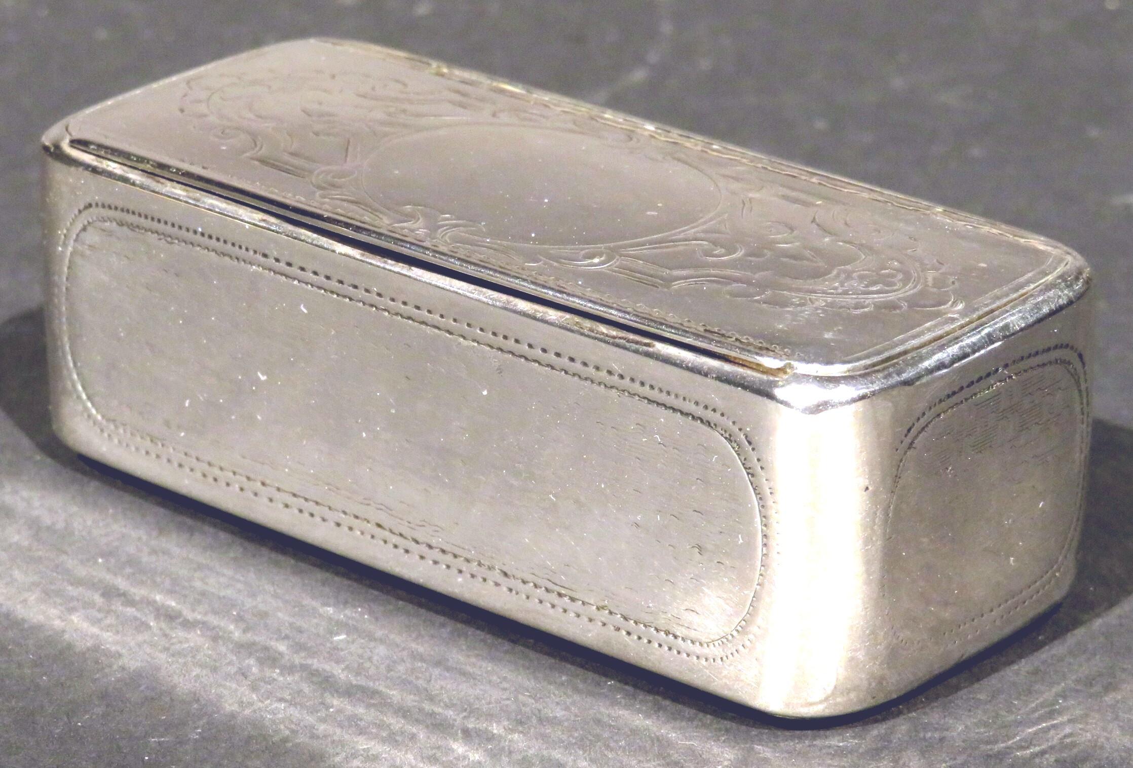 A very attractive mid-19th century Austrian silver (.800 fine) snuff box of oblong form, the exterior decorated with basket-weave motifs within oval cartouches, the hinged lid opening to a richly gilded interior with impressed town mark for Vienna