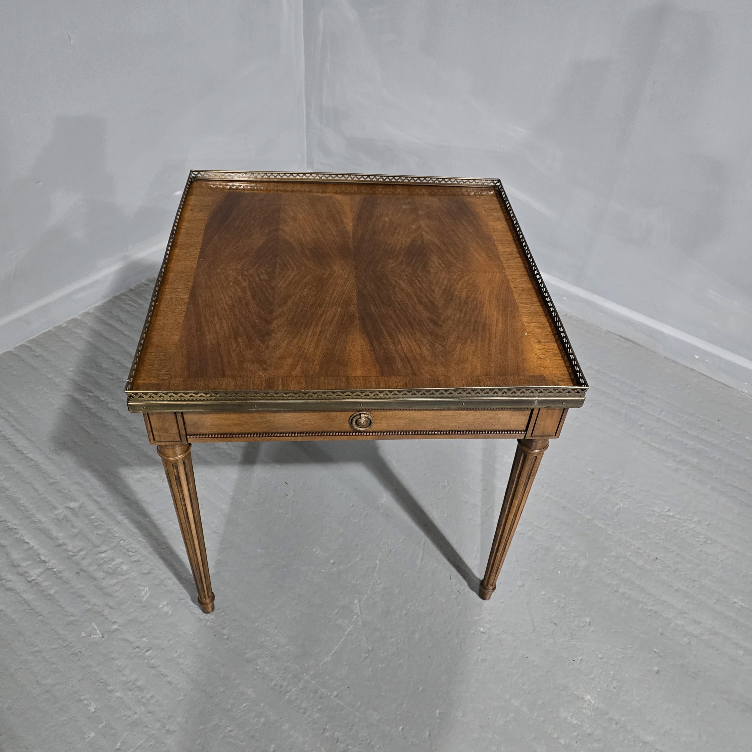 Lovely quality mahogany end lamp table with full width drawer and brass gallery, in overall very good  colour and condition.

26