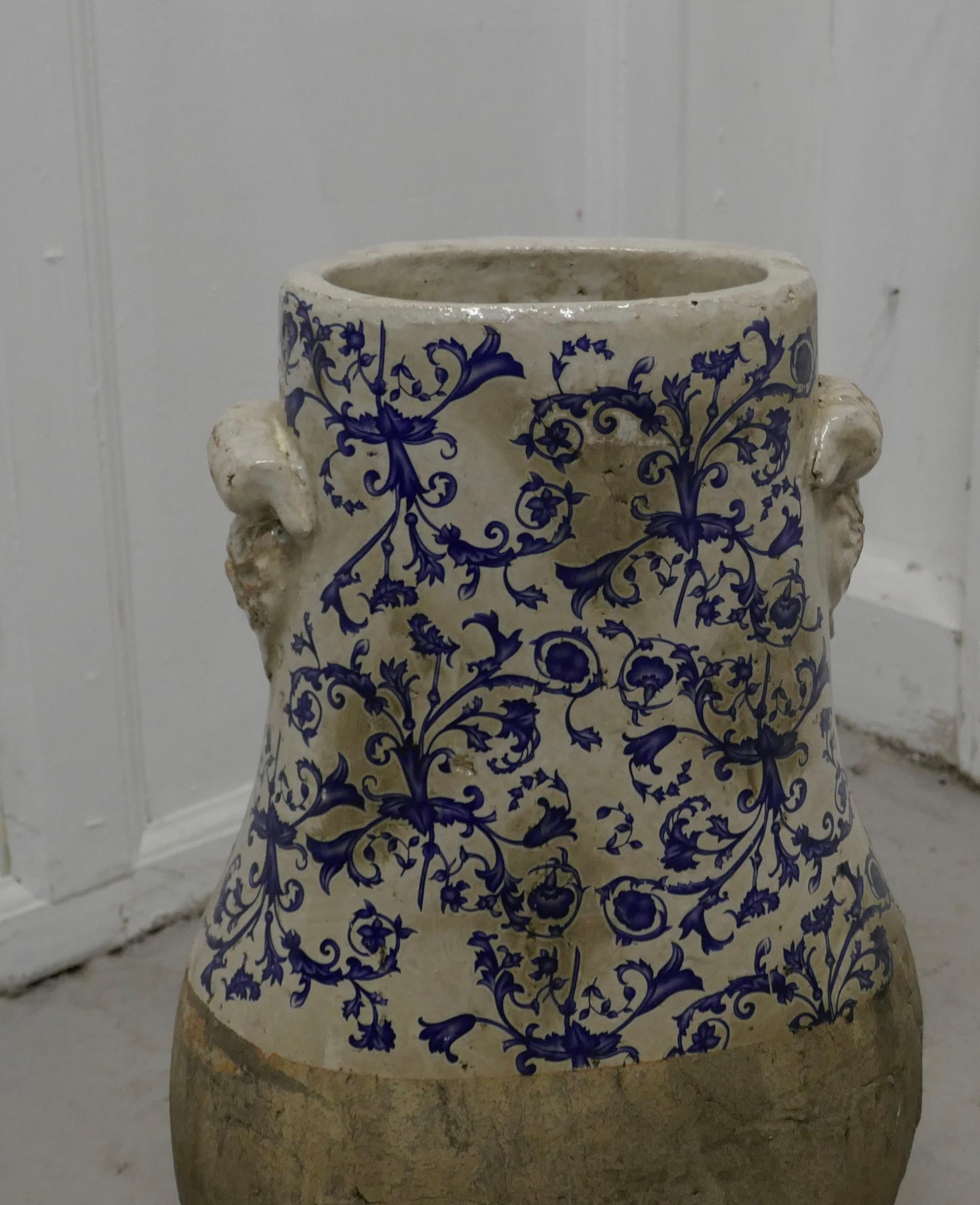 Very heavy 19th century Dutch Delft Earthenware cooler pot

A lovey piece hand painted and fired to be weather resistant, the larger lower part of the pot would have been buried to keep the contents cool, (possibly a dairy Pot)
The pot has sturdy