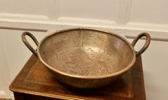 Very Heavy Hand Beaten Brass Dish with Handles  A very heavy and well made piece