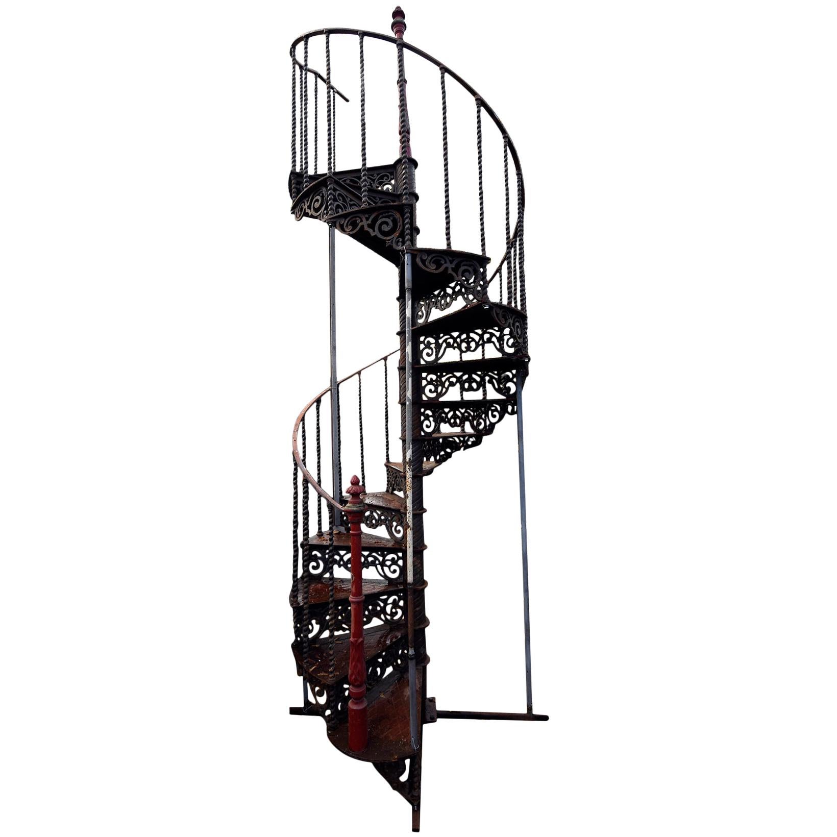 A very nice and heigh 19th century cast iron spiral staircase.
Measurements:
Height 390 cm.
Diameter 130 cm.

This stair comes from a mansion near Paris, France.
Ideal for big spaces like Lofts, hotels, or other large rooms.
It can be easily