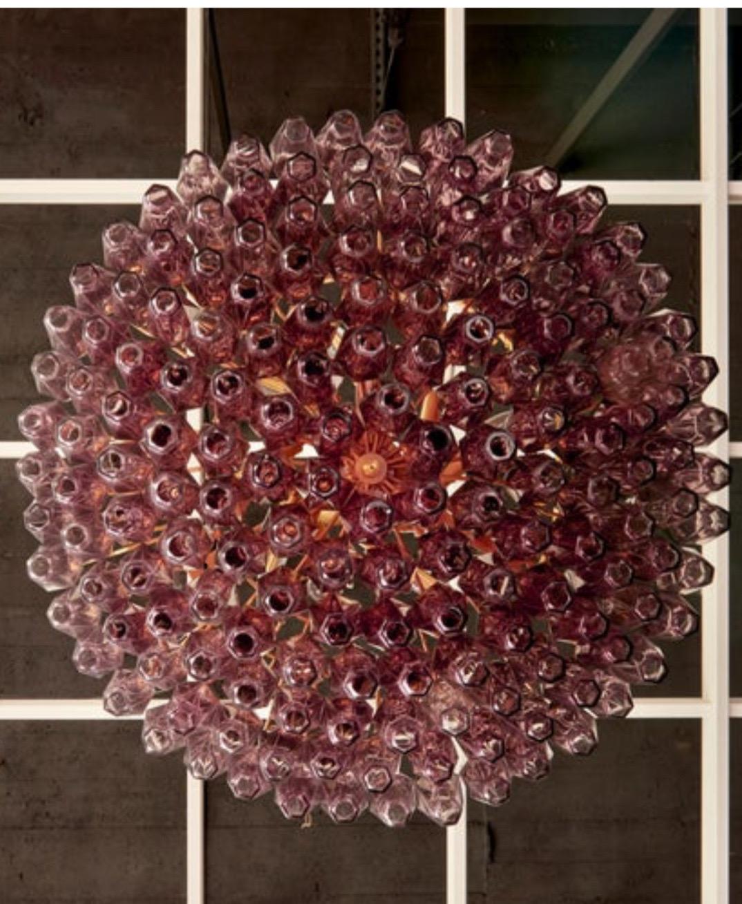 Very huge handblown amethyst Murano glass poliedri or polyhedral chandelier in the manner of Carlo Scarpa for Venini. The chandelier has a impressive size and is in very good condition. 

To be on the safe side, the lamp should be checked locally by