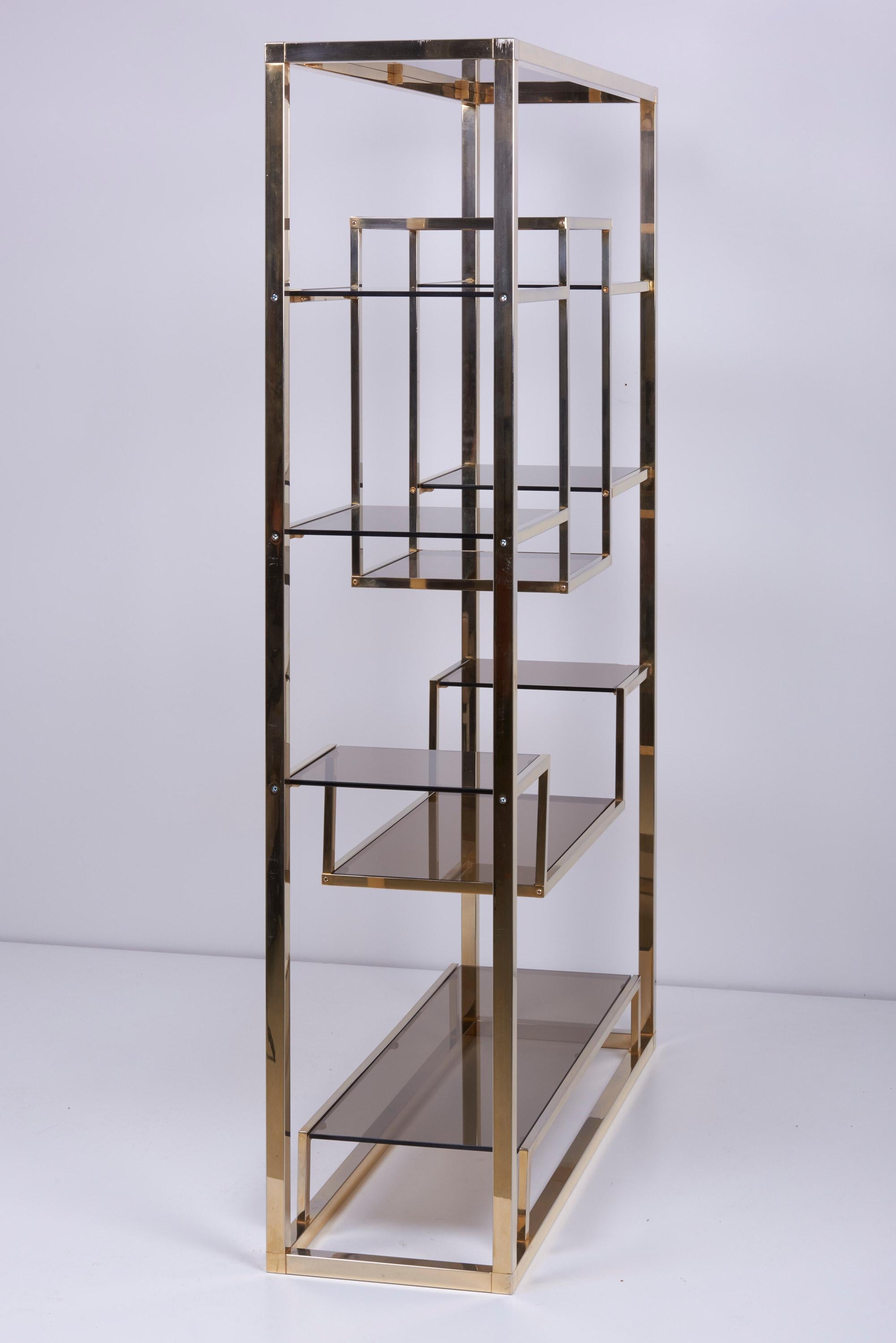 Hollywood Regency Very Huge Brass and Tinted Glass Bookshelf or Étagère in the style of Romeo Rega