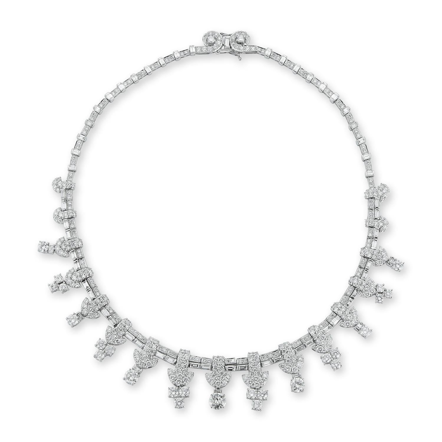 Art Deco Diamond Necklace
1 large old European cut diamond approximately 1.39 carat
24 smaller round cut diamonds approximately6.23 carat 
64 baguette cut diamonds 
286 round diamonds 
Total approximate diamond weight: 26 carats
VERY finely made