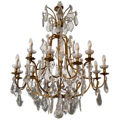 Très important lustre à cage en bronze avec pendentifs de style Louis XVI