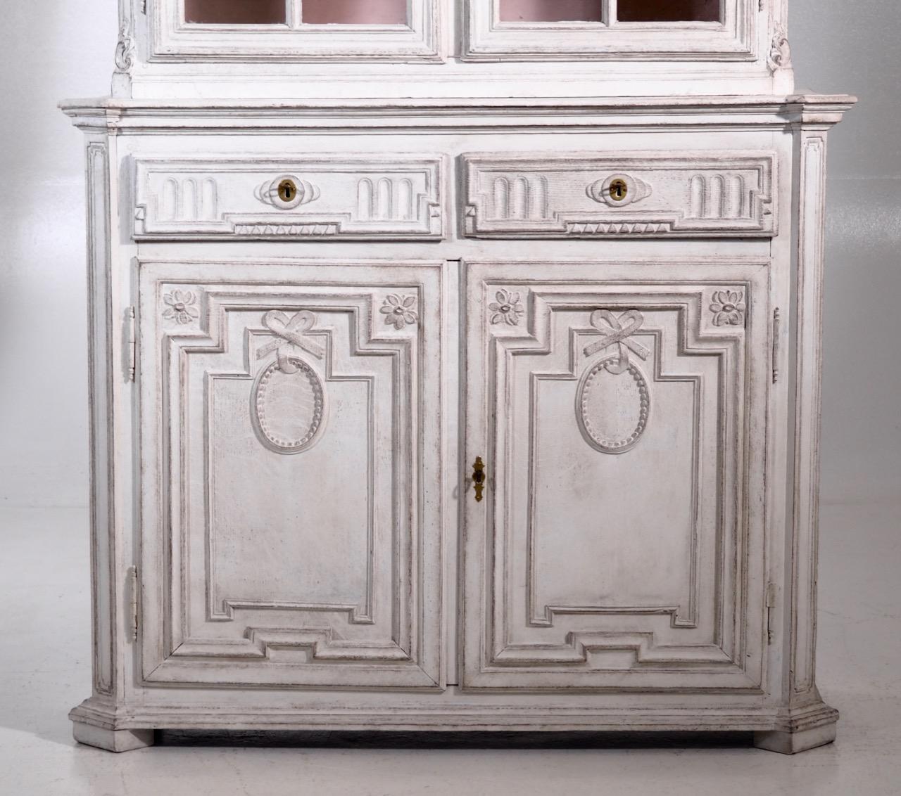 Very important French two-parts vitrine cabinet, richly carved, circa 1770-1990.