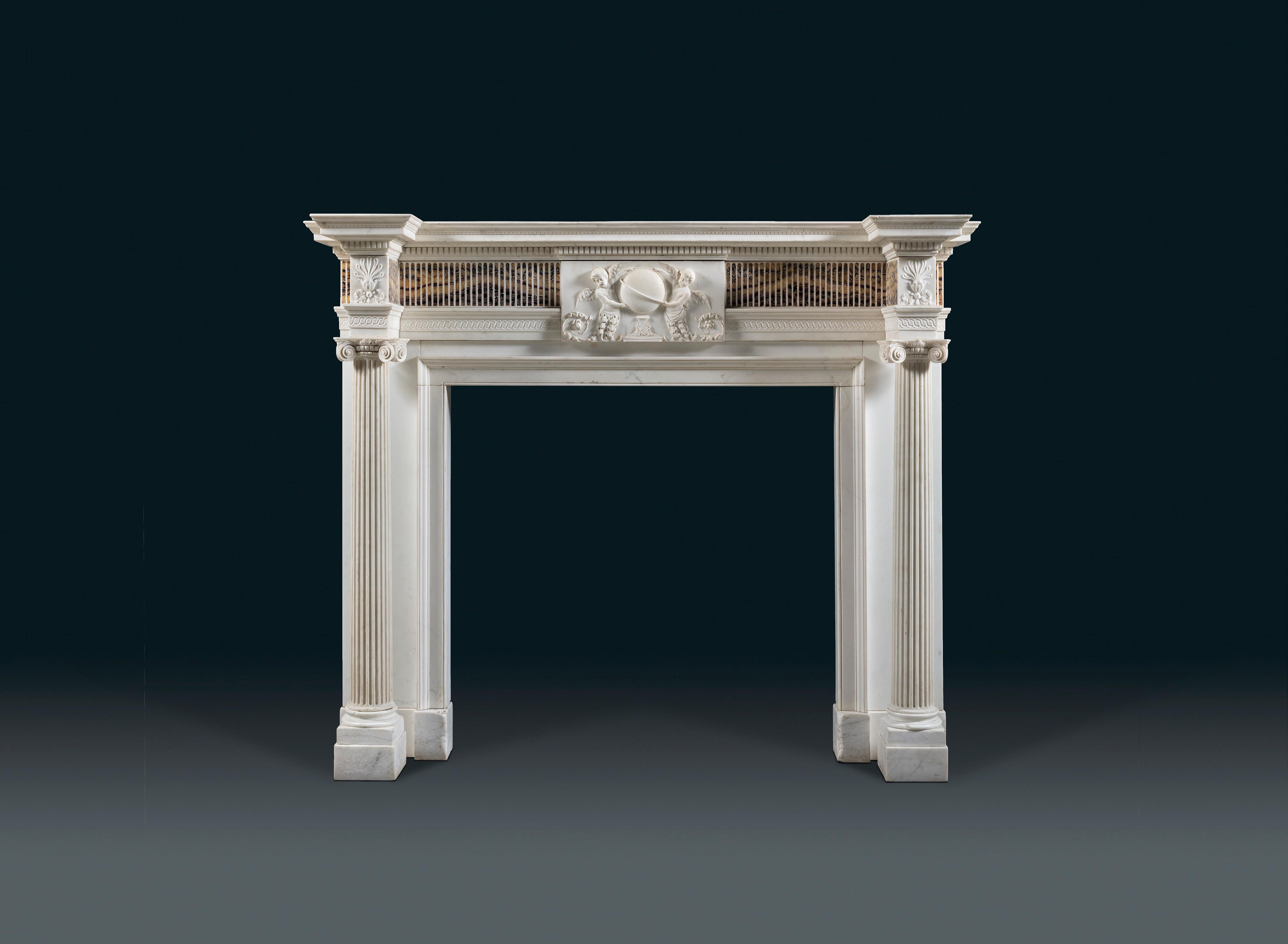 The chimneypiece bears a center tablet that closely resembles that by Robert Adam in the library at Kenwood House, the overall form echoing his work in its detail and in the quality of its execution. With detached fluted columns terminating in ionic