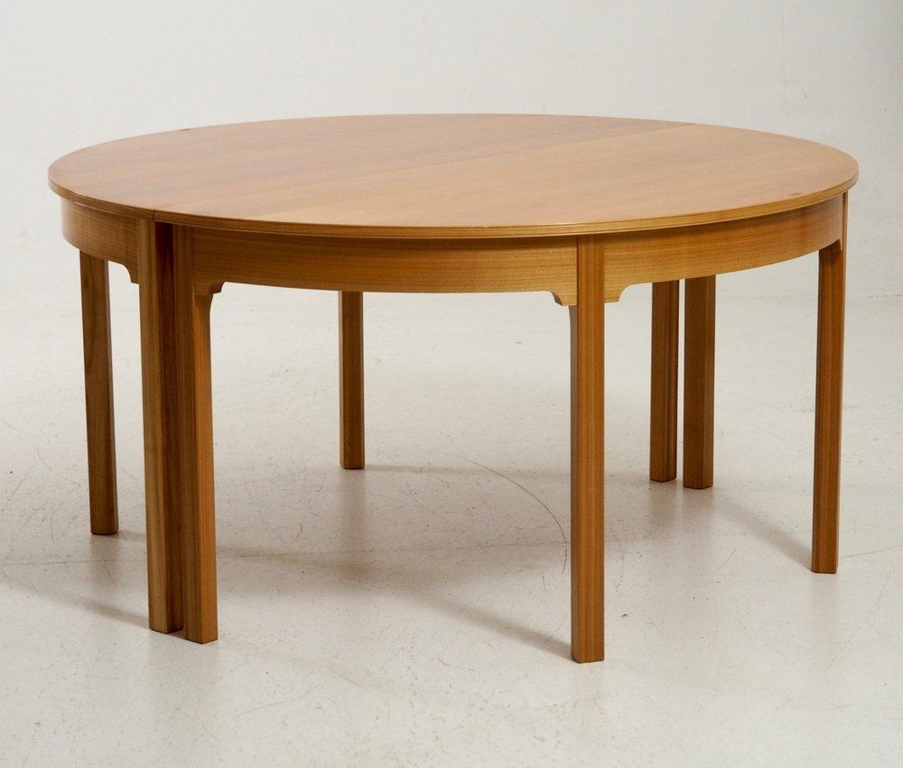 Very important table by Kaare Klint. Kaare Klint was one of the most important Danish architect in 20th century. The table is made in rosewood and signed from Rud. Rasmussen.

Measurement:
H. 74, L-with demilune. 292 L-without demilune. 146 D.