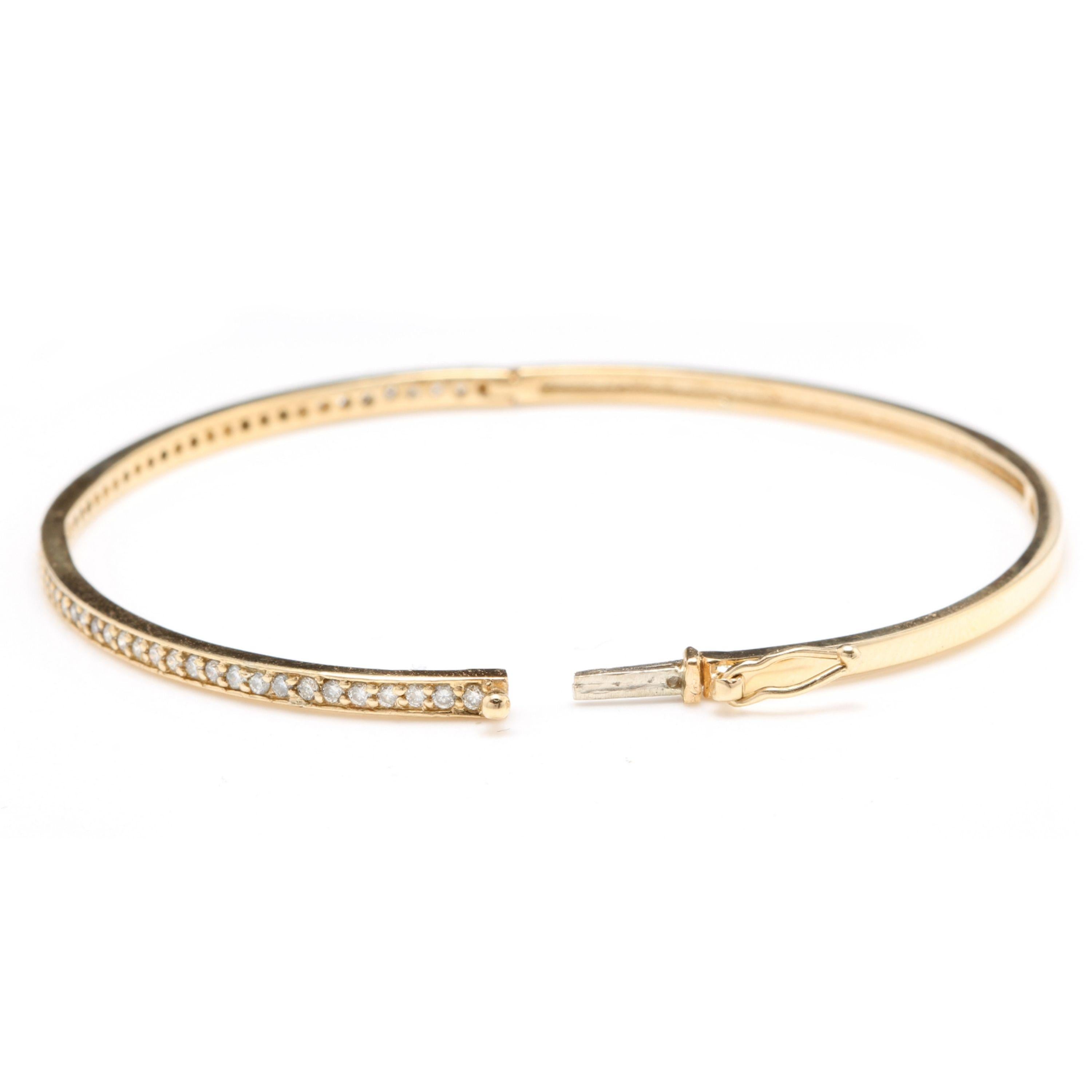 Very Impressive 0.75 Carats Natural Diamond 14K Solid Yellow Gold Bangle Bracelet

STAMPED: 14K


Total Natural Round Diamonds Weight: Approx. 0.75 Carats (color G-H / Clarity SI1-SI2)

Bangle Wrist Size is: 7 inches

Width: 2.42mm

Bracelet total
