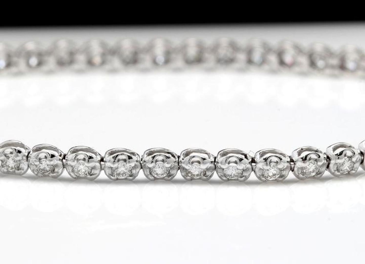 Very Impressive 1.15 Carats Natural Diamond 14K Solid White Gold Bracelet

STAMPED: 14K

Total Natural Round Diamonds Weight: 1.15 Carats (color G-H / Clarity SI1-SI2)

Bracelet Length is: 7 inches

Width: 3.10mm

Bracelet total weight: