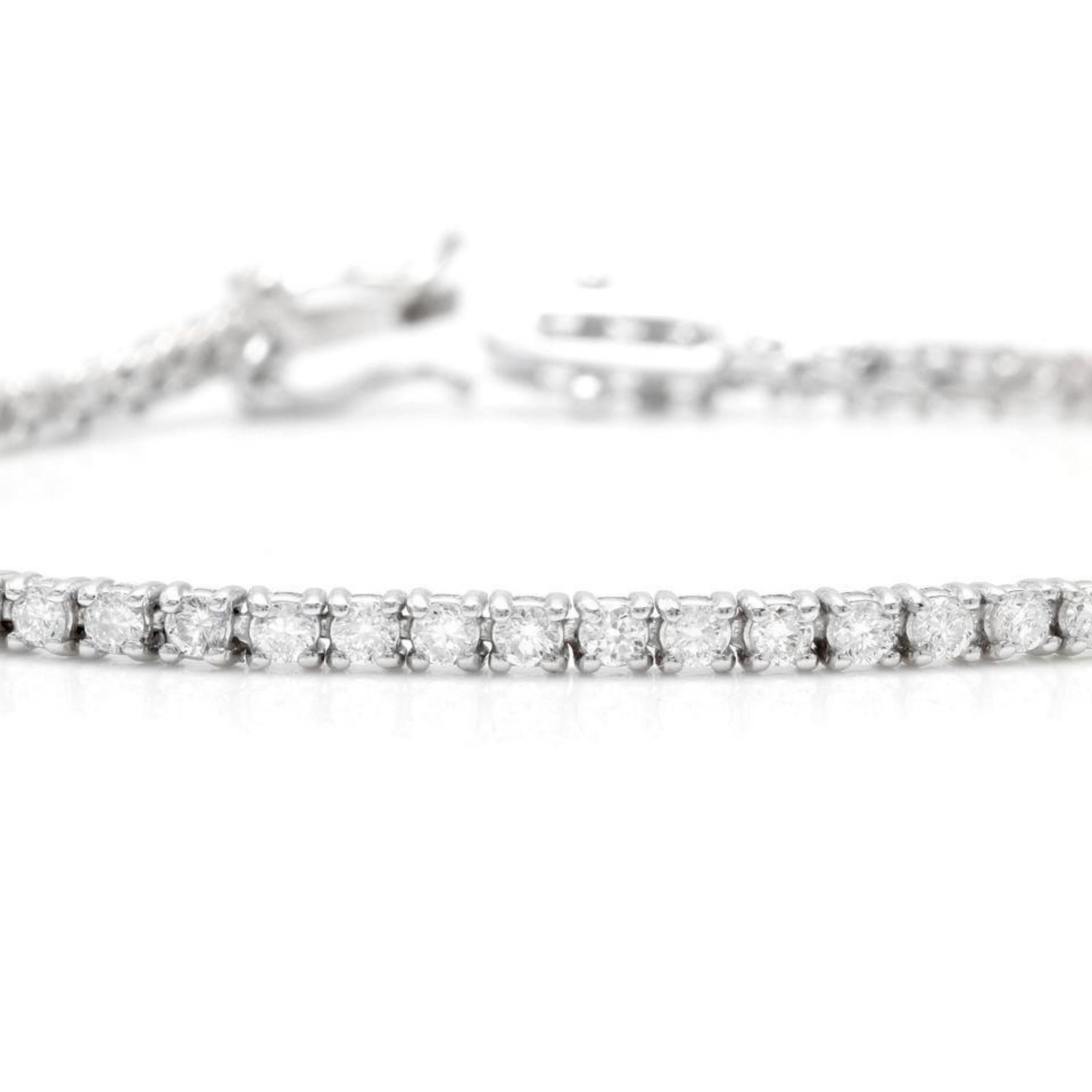 Very Impressive 3.00 Carats Natural Diamond 14K Solid White Gold Bracelet

STAMPED: 14K

Total Natural Round Diamonds Weight: Approx. 3.00 Carats (color H / Clarity SI1-SI2)

Bracelet Length is: 7 inches

Width: 2.4mm

Bracelet total weight: Approx.