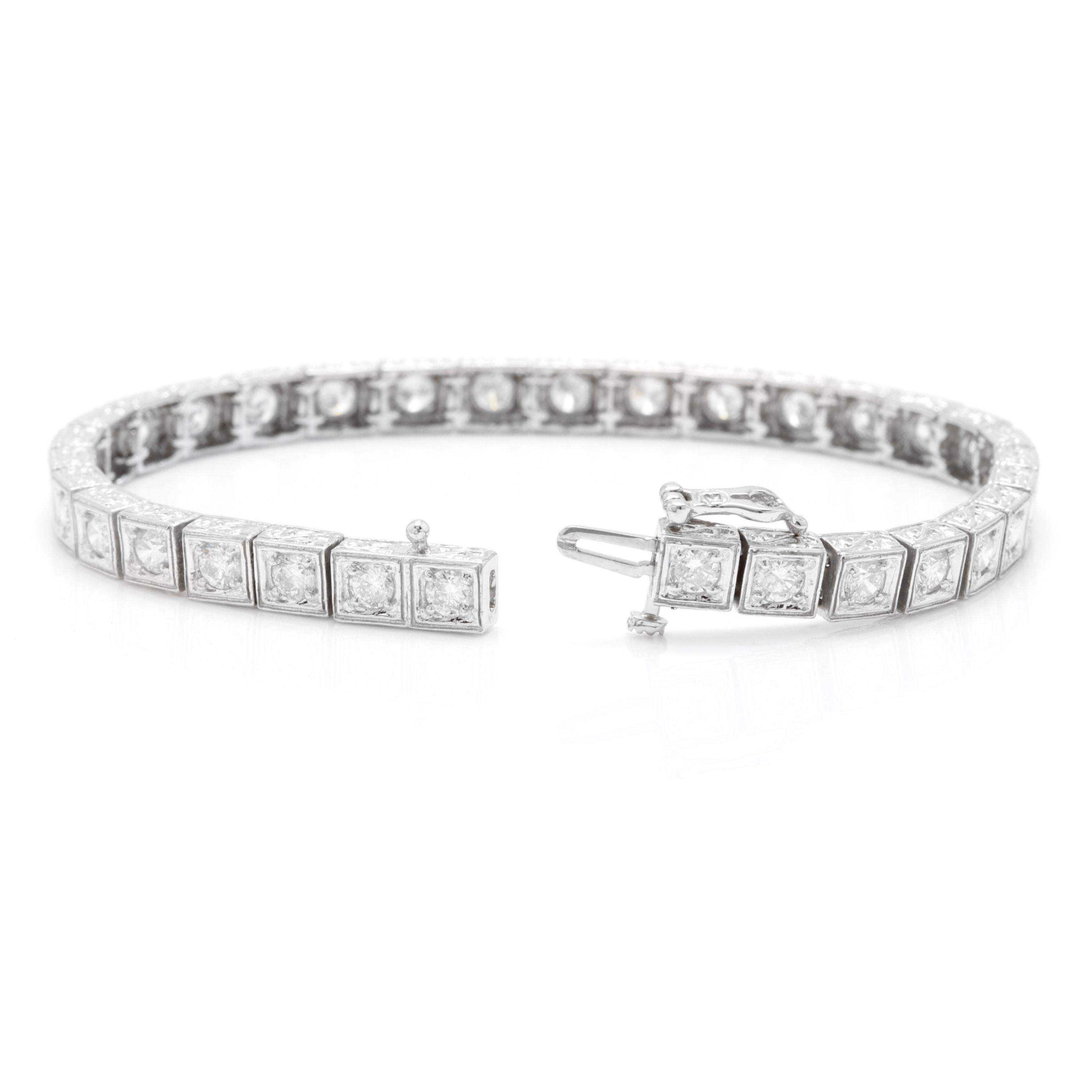 Very Impressive 3.20 Carats Natural Diamond 14K Solid White Gold Bracelet

STAMPED: 14K

Total Natural Round Diamonds Weight: Approx. 3.20 Carats (color G-H / Clarity SI1-SI2)

Bracelet Length is: 7 inches

Width: 5mm

Thickness: 3.45mm

Bracelet