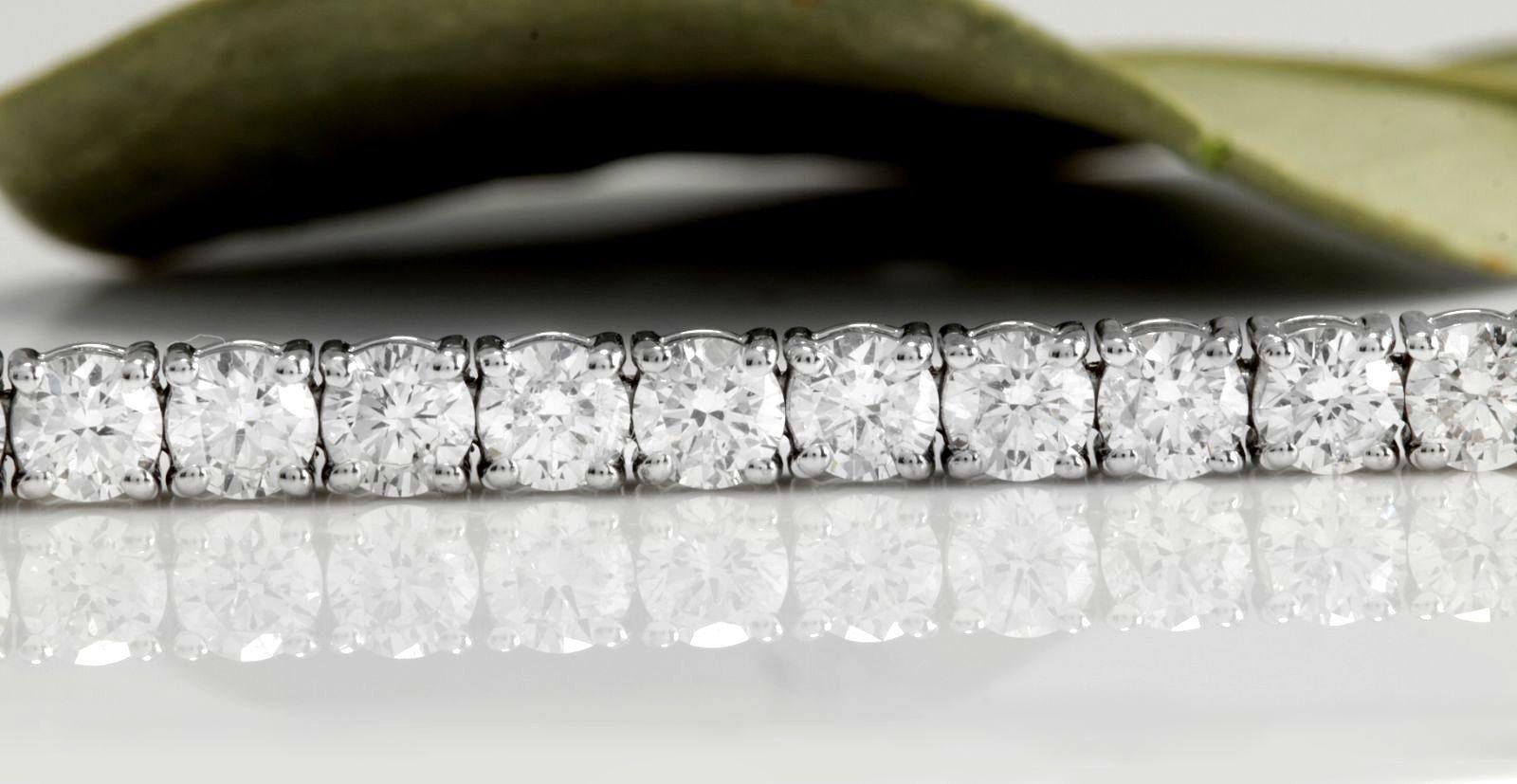 Very Impressive 3.75 Carats Natural VS Diamond 14K Solid White Gold Bracelet

STAMPED: 14K

Total Natural Round Diamonds Weight: 3.75 Carats (color F-G / Clarity VS1-VS2)

Bracelet Length is: 7 inches

Width: 3.18mm

Bracelet total weight: