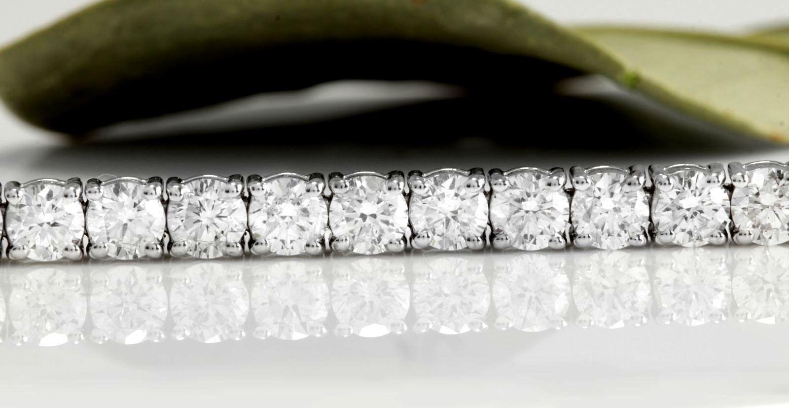 Very Impressive 3.75 Carats Natural VS Diamond 14K Solid White Gold Bracelet

STAMPED: 14K

Total Natural Round Diamonds Weight: 3.75 Carats (color H / Clarity VS1-VS2)

Bracelet Length is: 7 inches

Width: 2.7mm

Bracelet total weight: