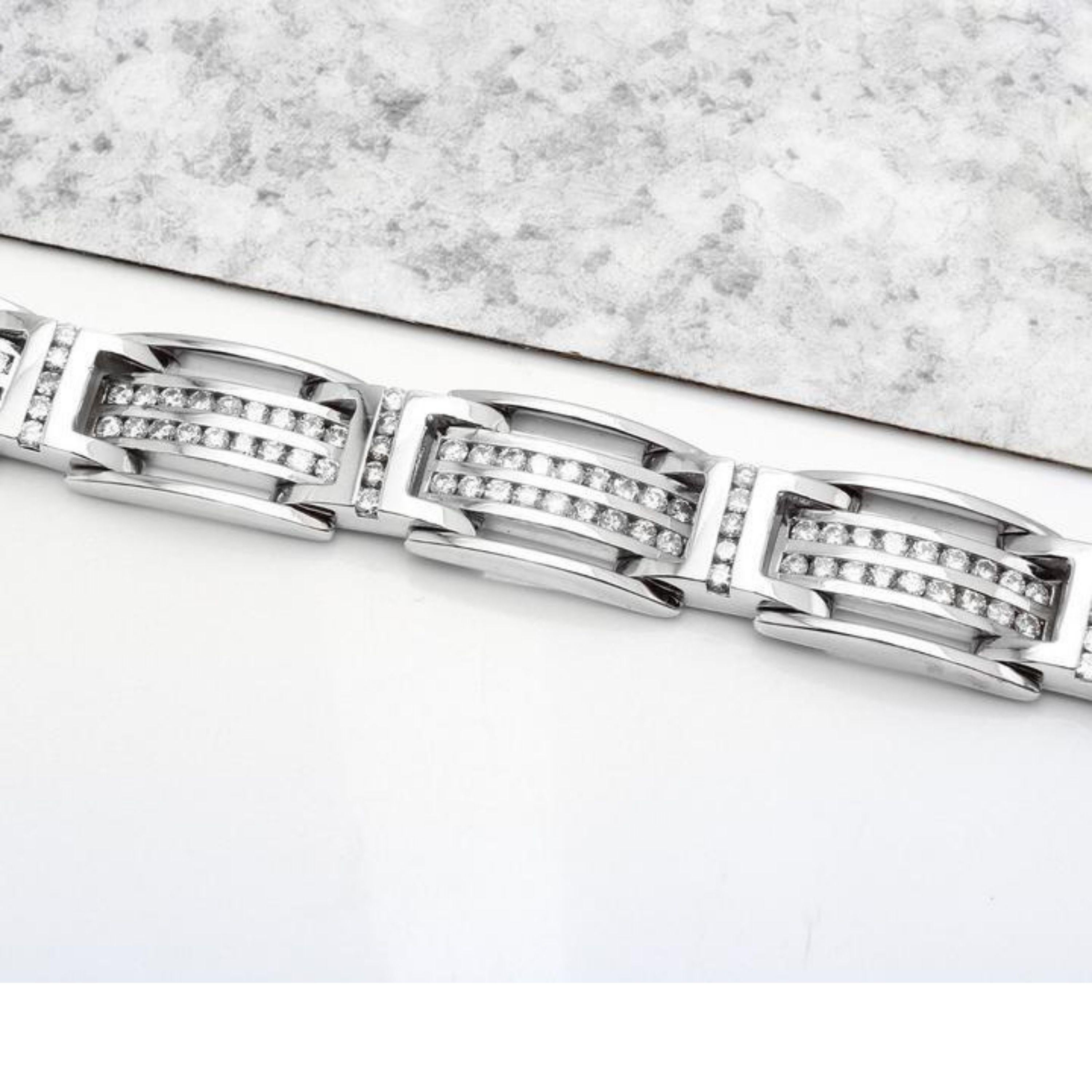 Very Impressive 5.67 Carats Natural Diamond 14K Solid White Gold Bracelet

STAMPED: 14K

Total Natural Round Cut Diamonds Weight is: 5.67 Carats (color H-I / Clarity SI1-SI3)

Bracelet Length is: 8.75 inches

Width: 12.47mm

Bracelet total weight: