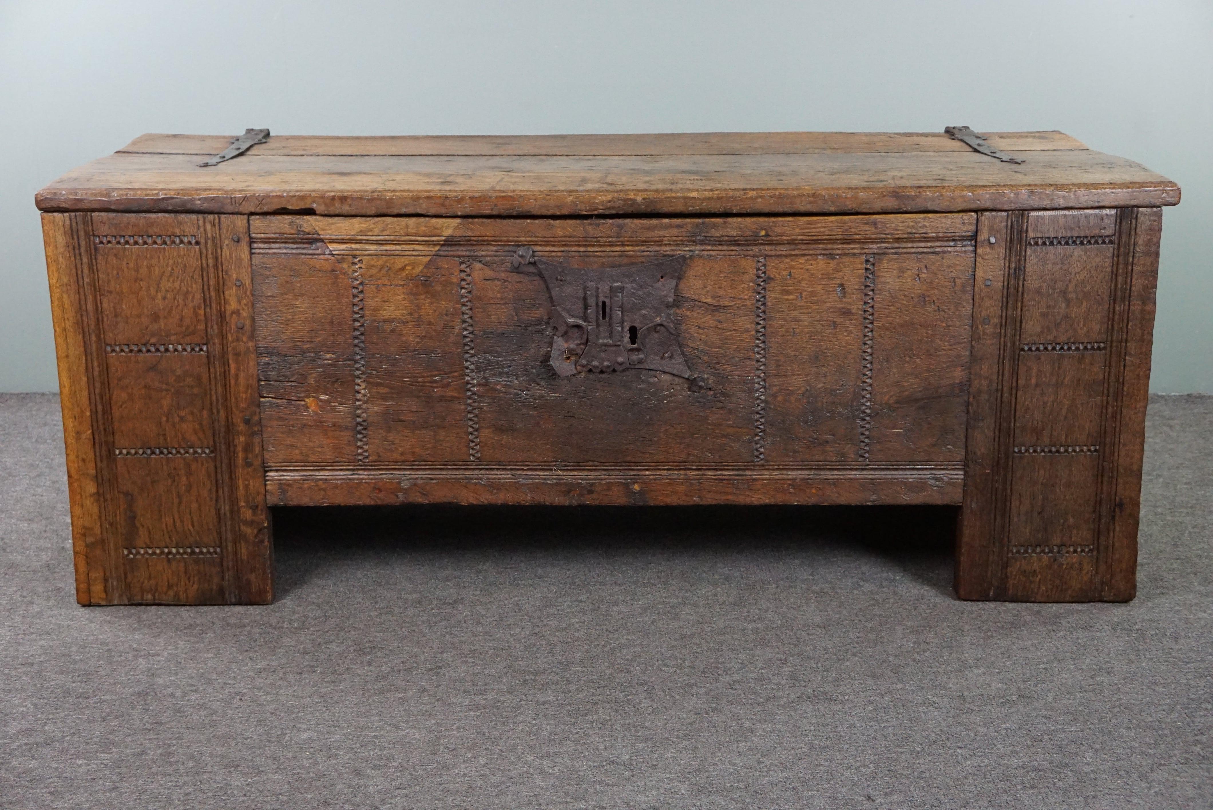Offered is this large and impressive 16th-century primitive oak chest, which can also serve very well as a coffee table, TV stand, hallway furniture, or toy/storage chest. Large, heavy, impressive, and mostly original. It brings us joy! Consider