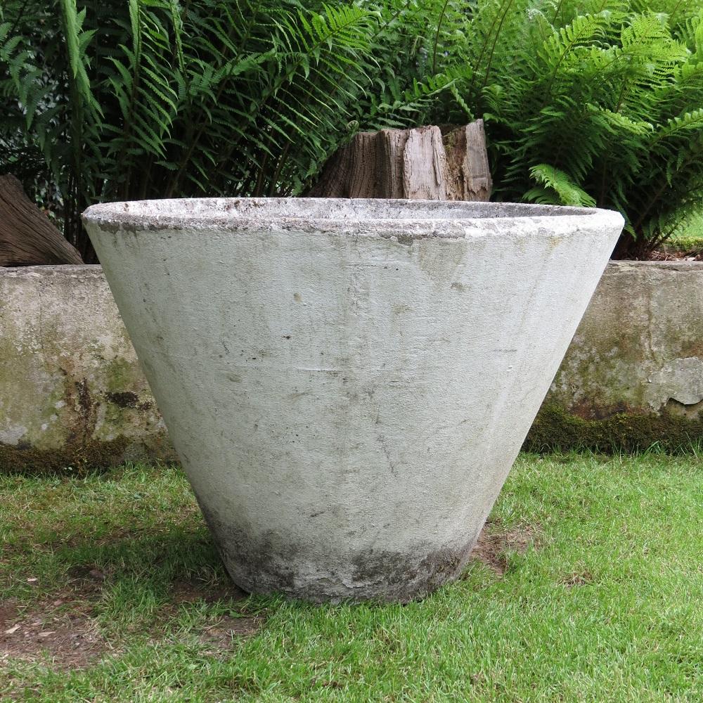 A wonderful, very large conical shaped garden planter, made from reinforced concrete. Dates from the 1970s and would have originally been displayed in town and shopping centres.  In good vintage condition, has been repainted, some distressing and